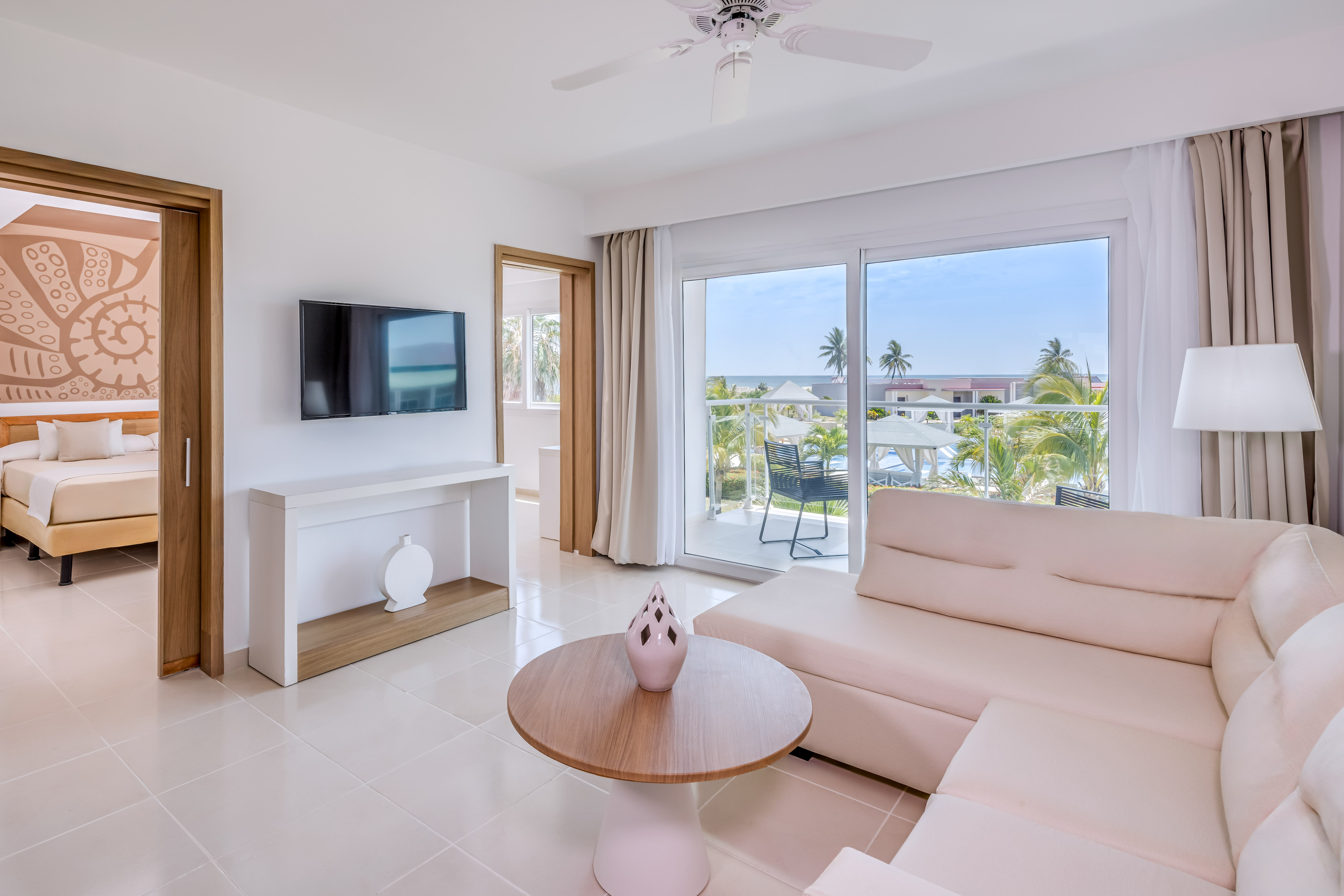 a living room with a television and a couch
