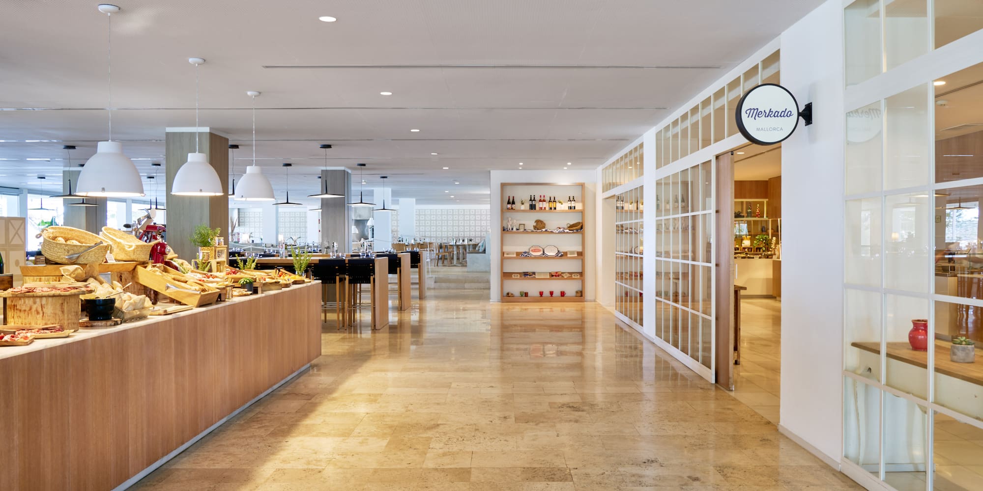 a room with a counter and shelves