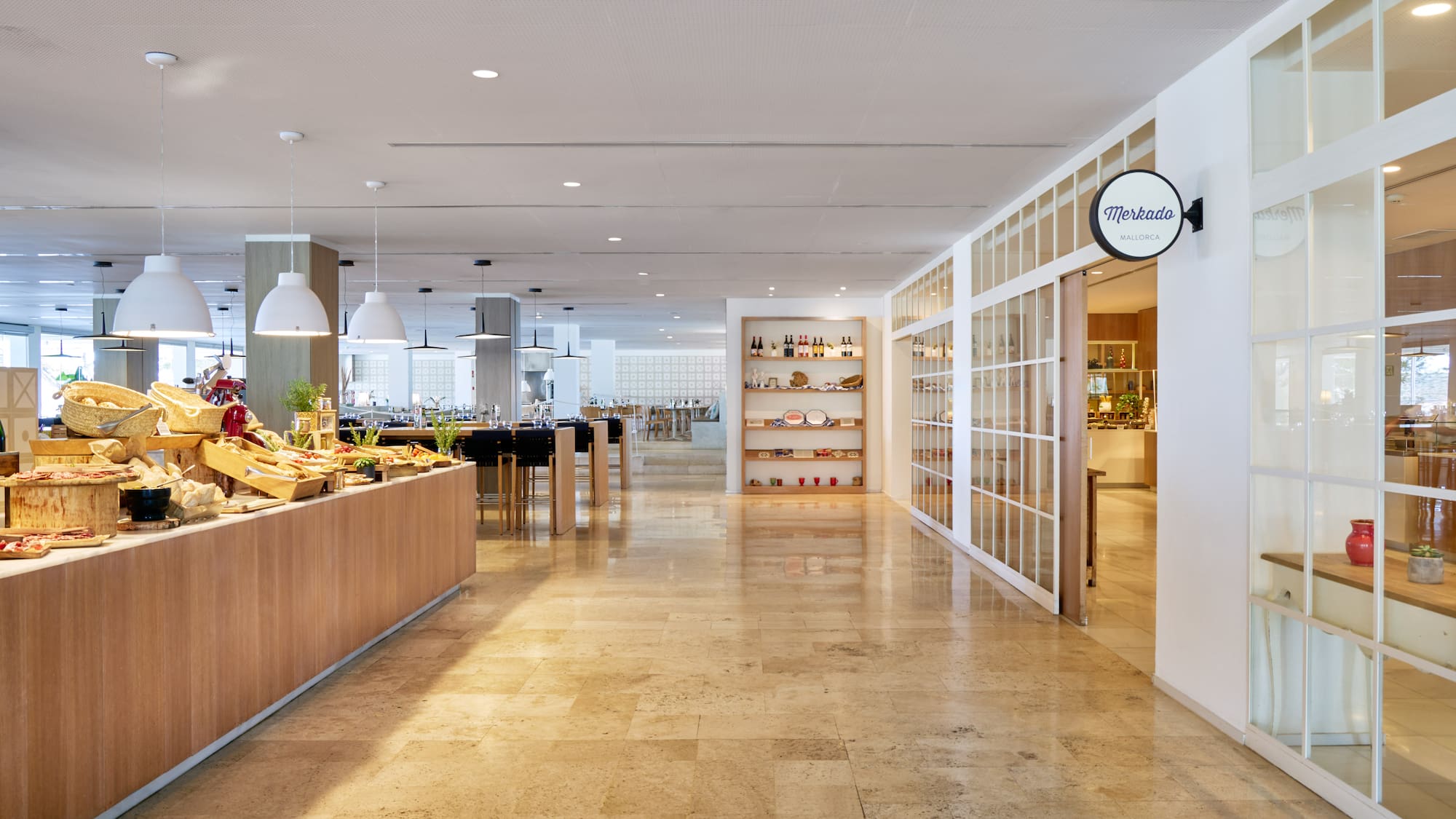 a room with a counter and shelves