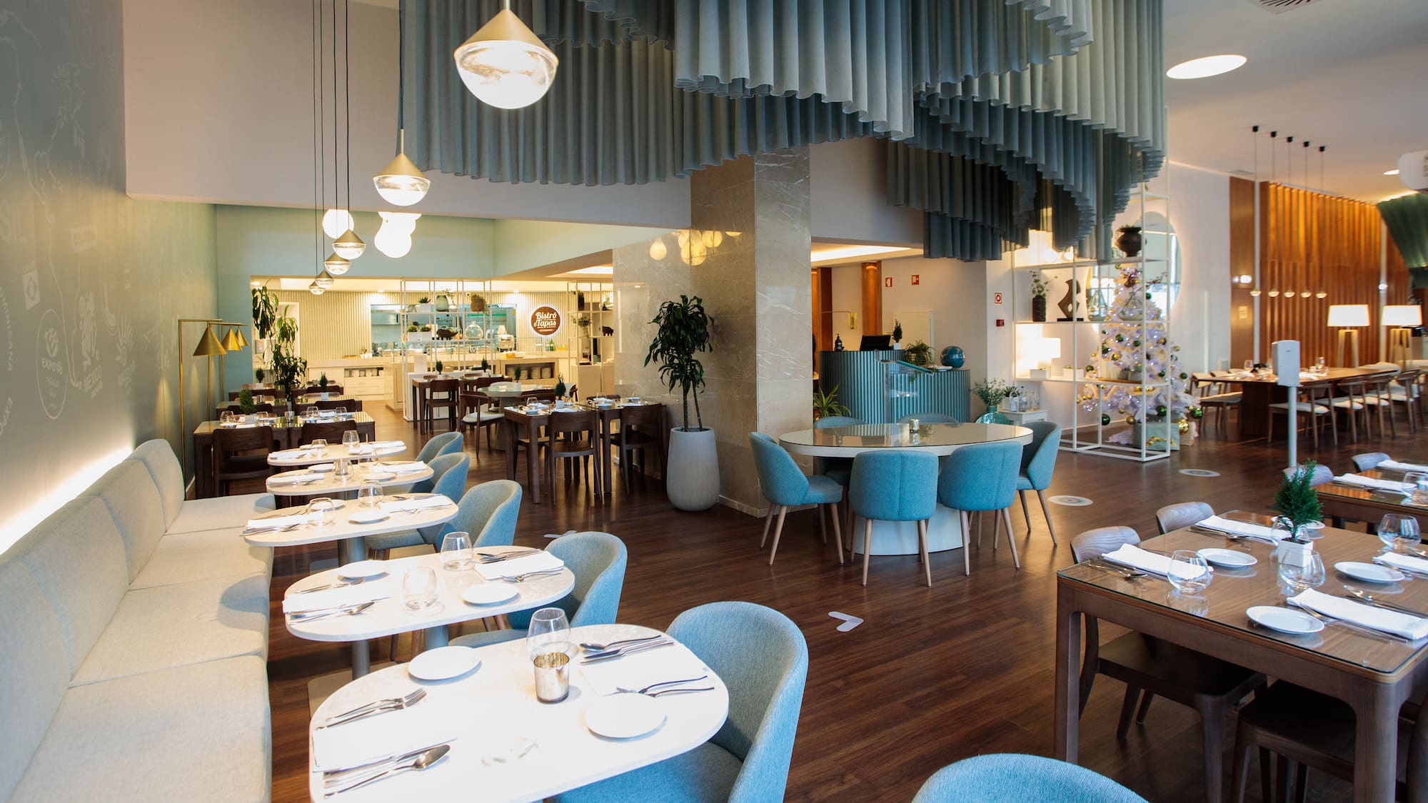 a restaurant with tables and chairs