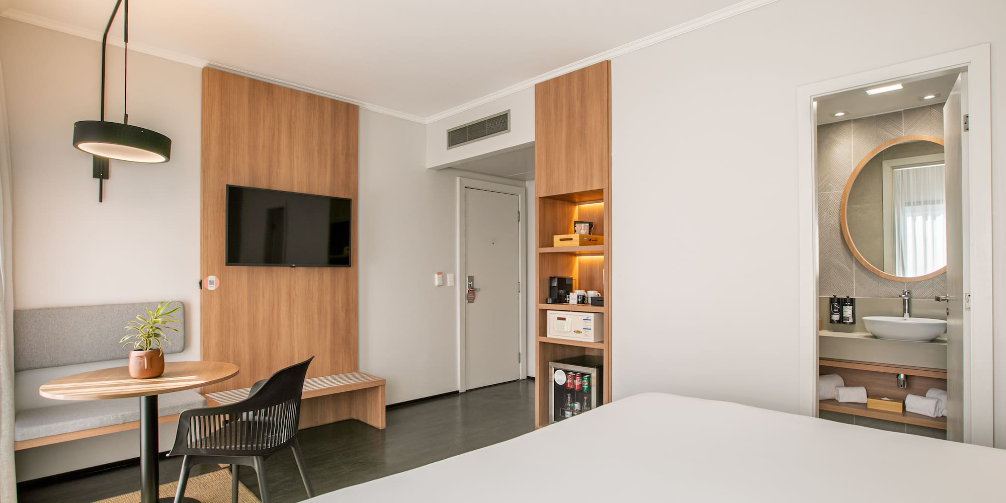 a room with a tv and a door