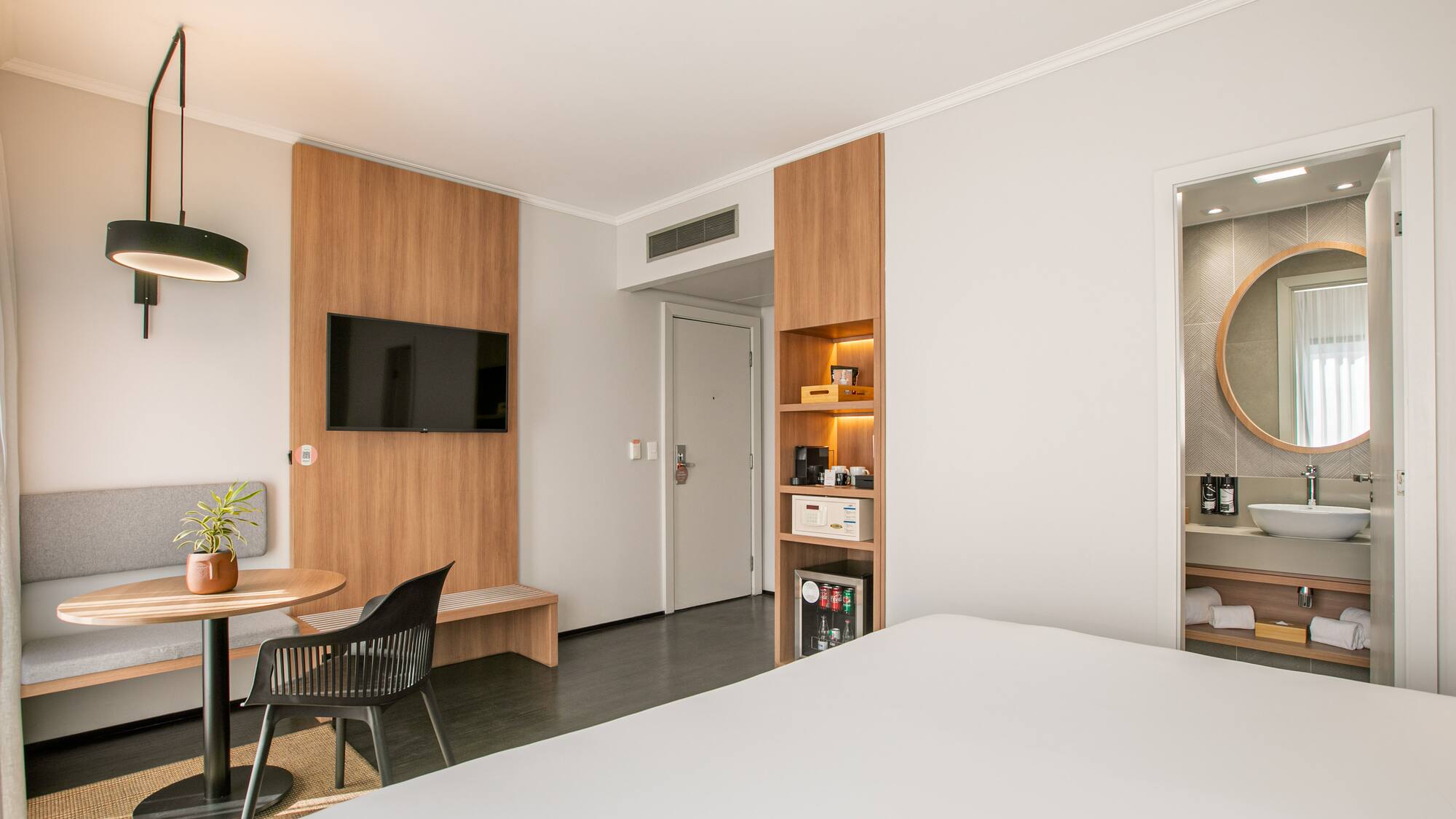 a room with a tv and a door