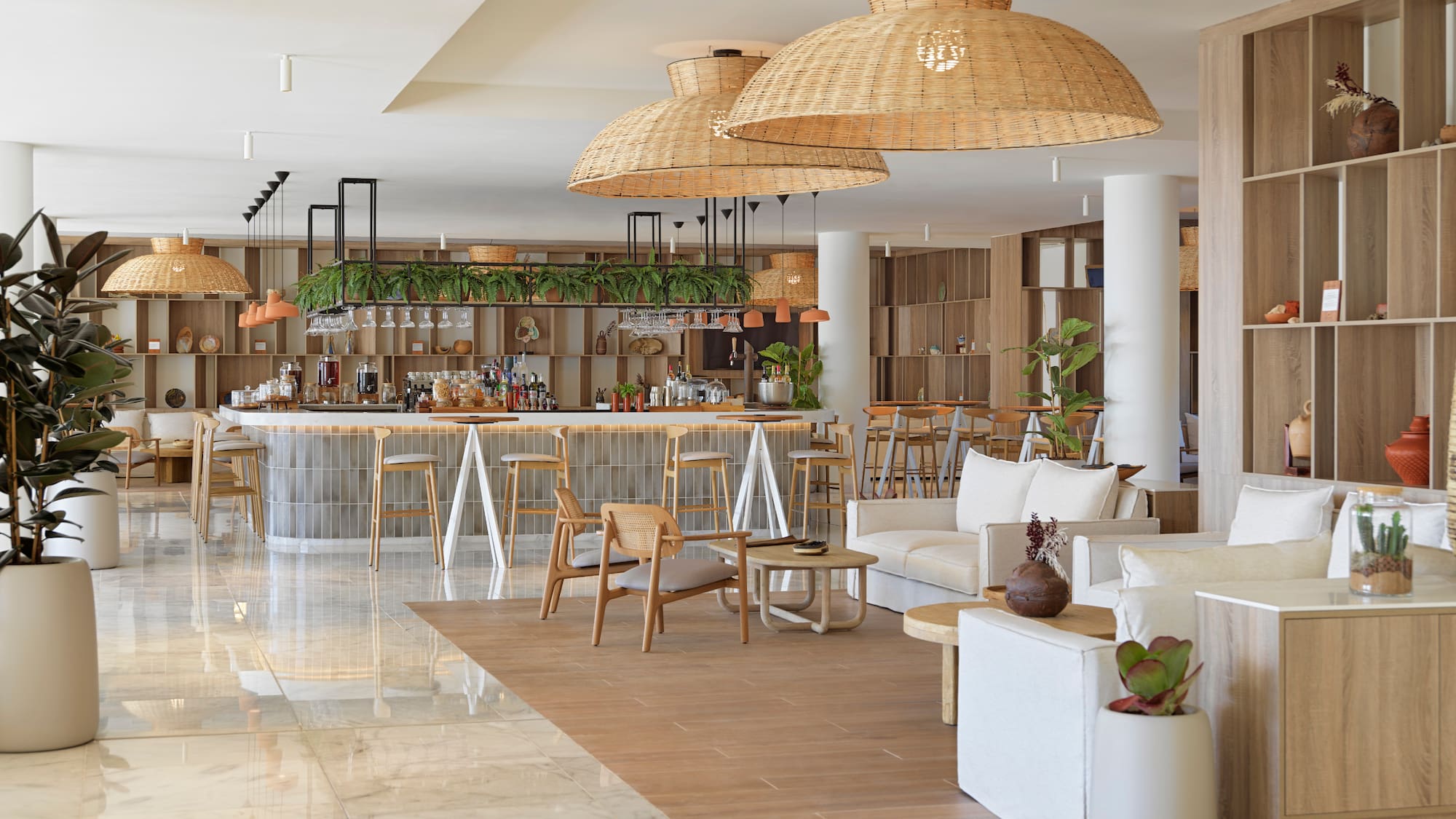 a room with a bar and chairs