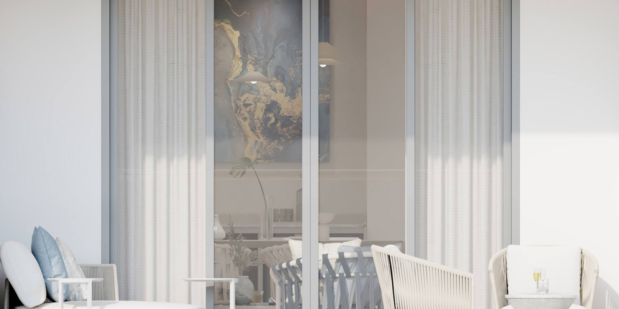 a glass doors with a table and chairs