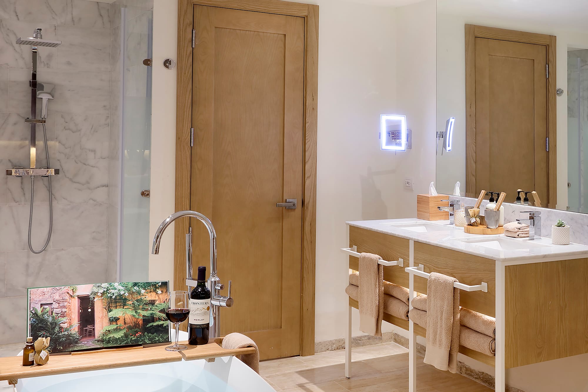 a bathroom with a tub and a sink