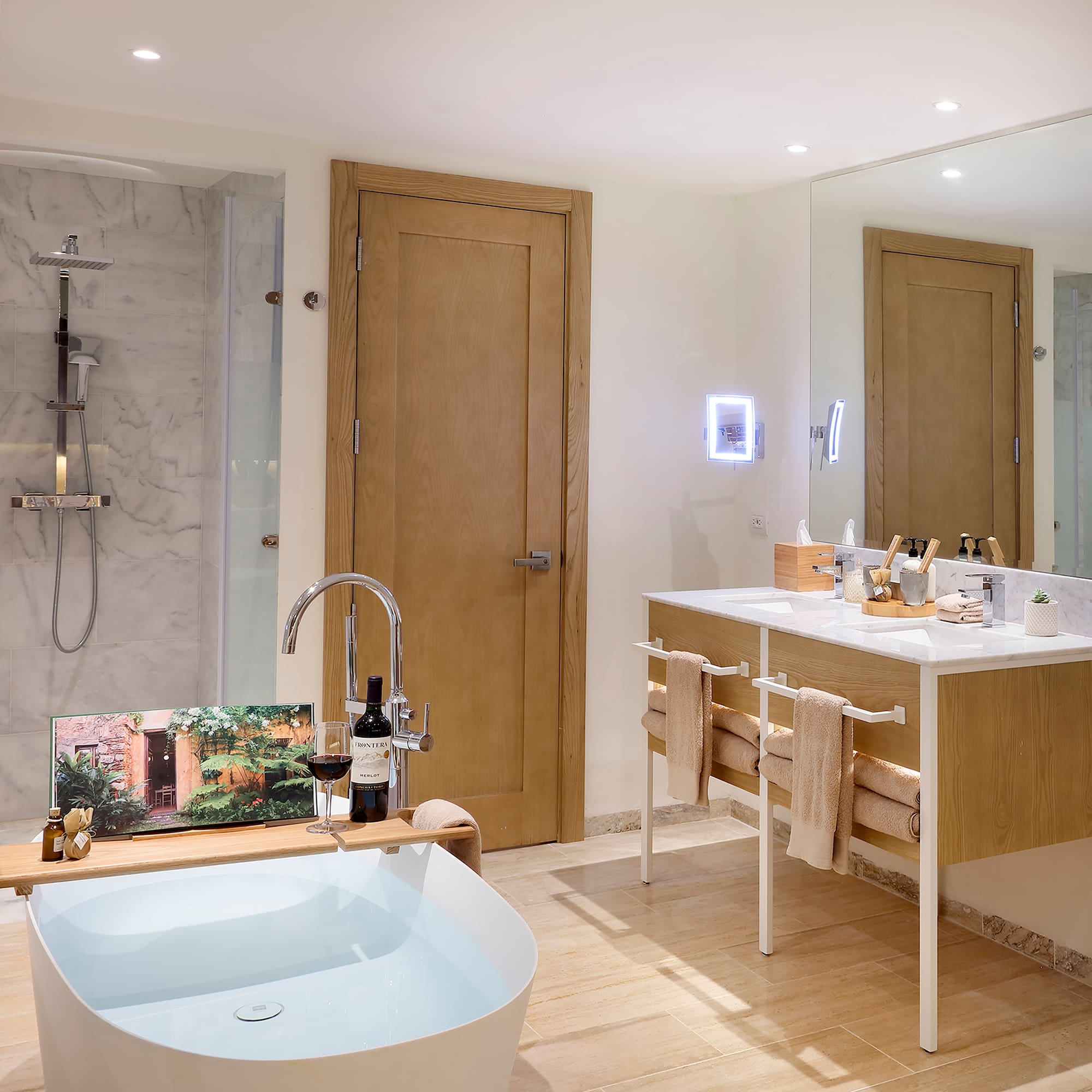a bathroom with a tub and a sink