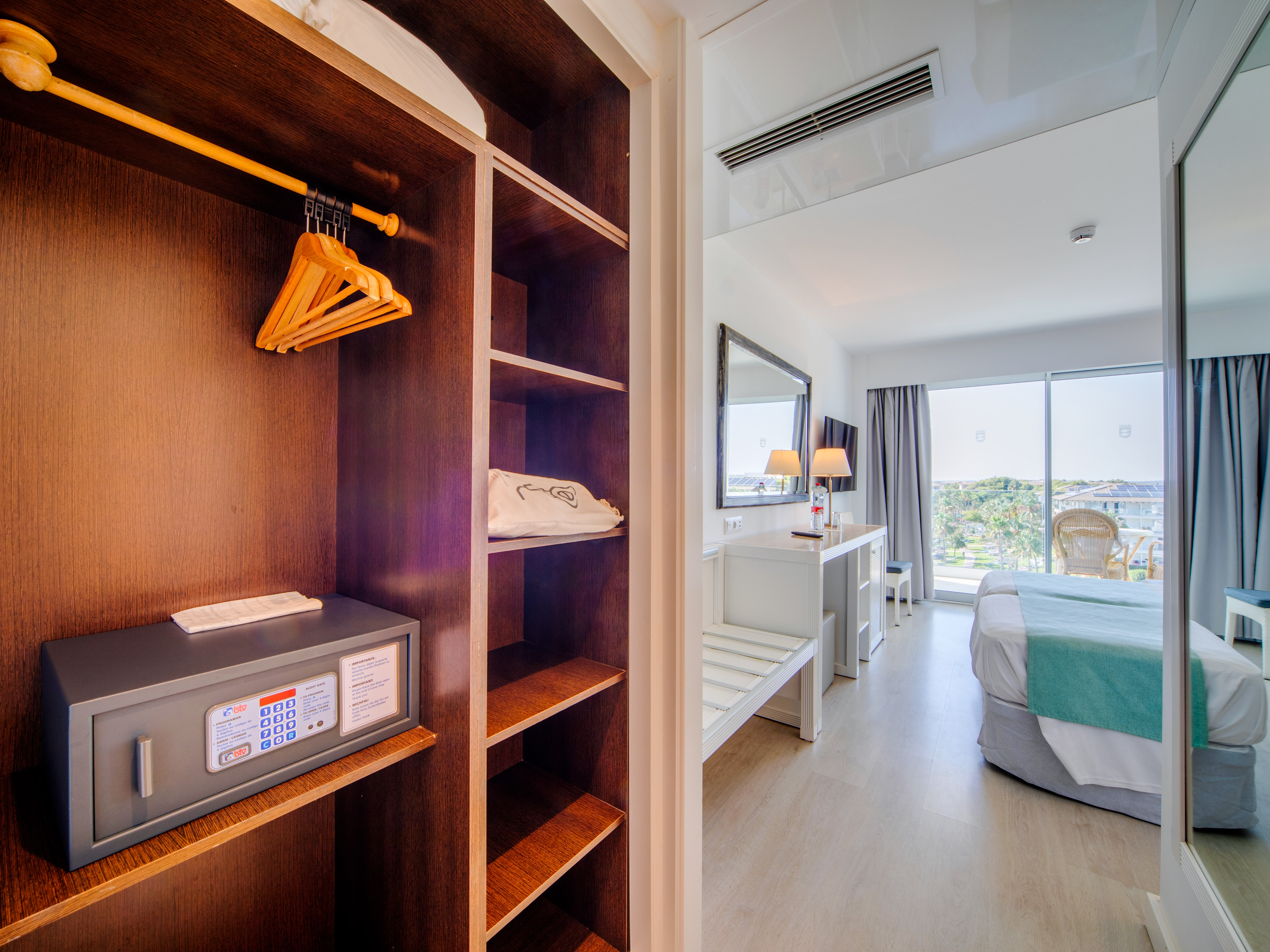 a room with a bed and a closet