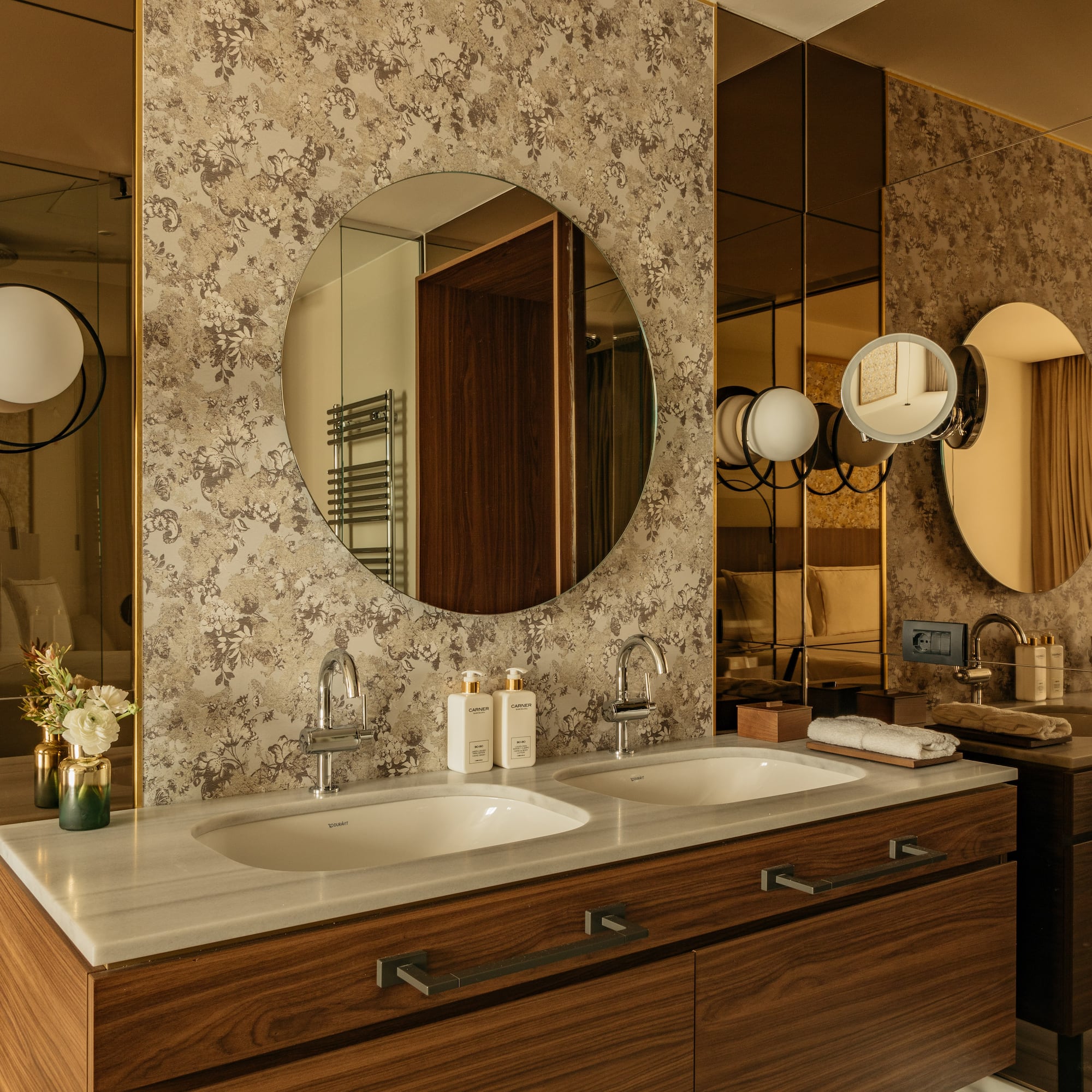 a bathroom with a mirror and sink