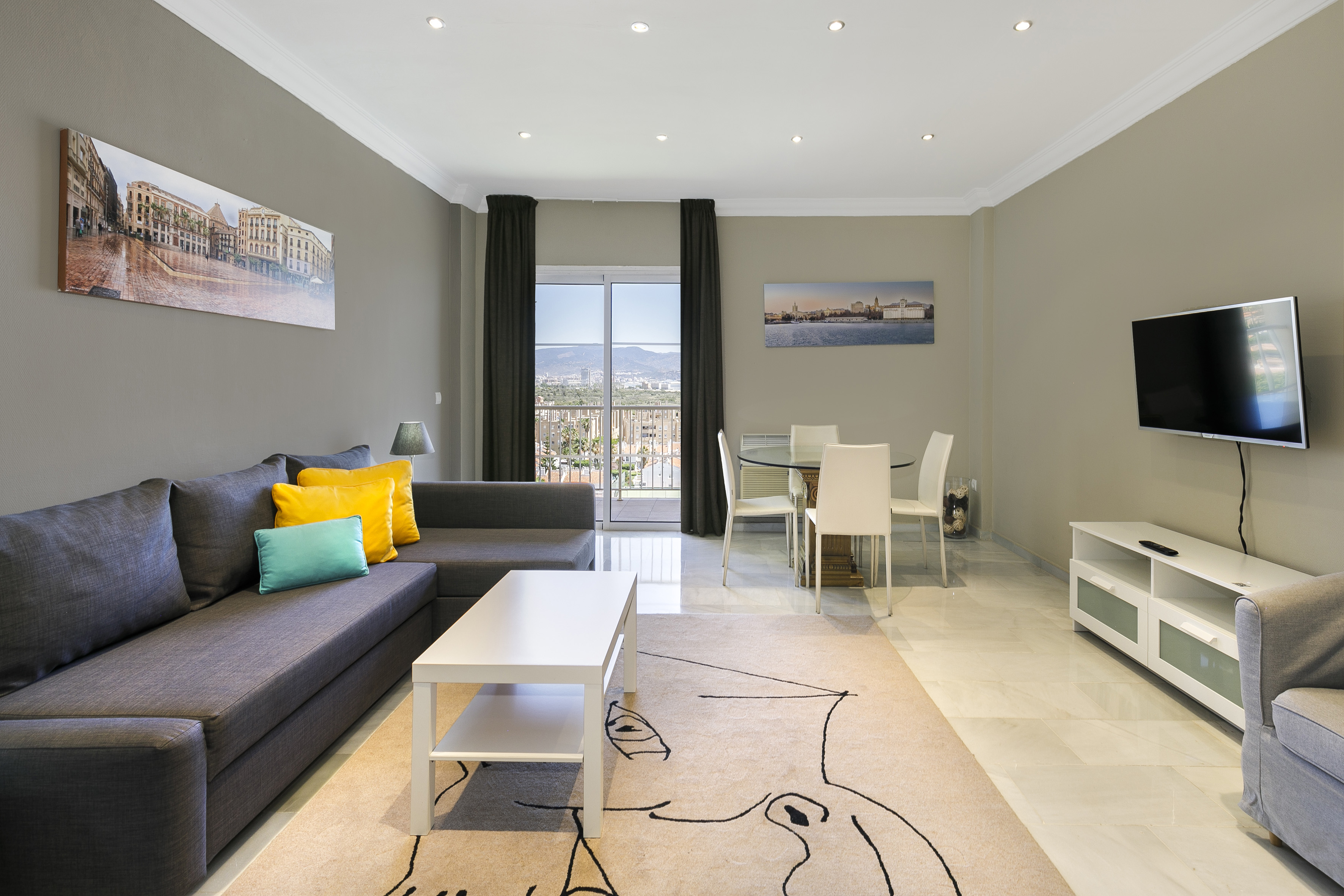 a living room with a couch and table