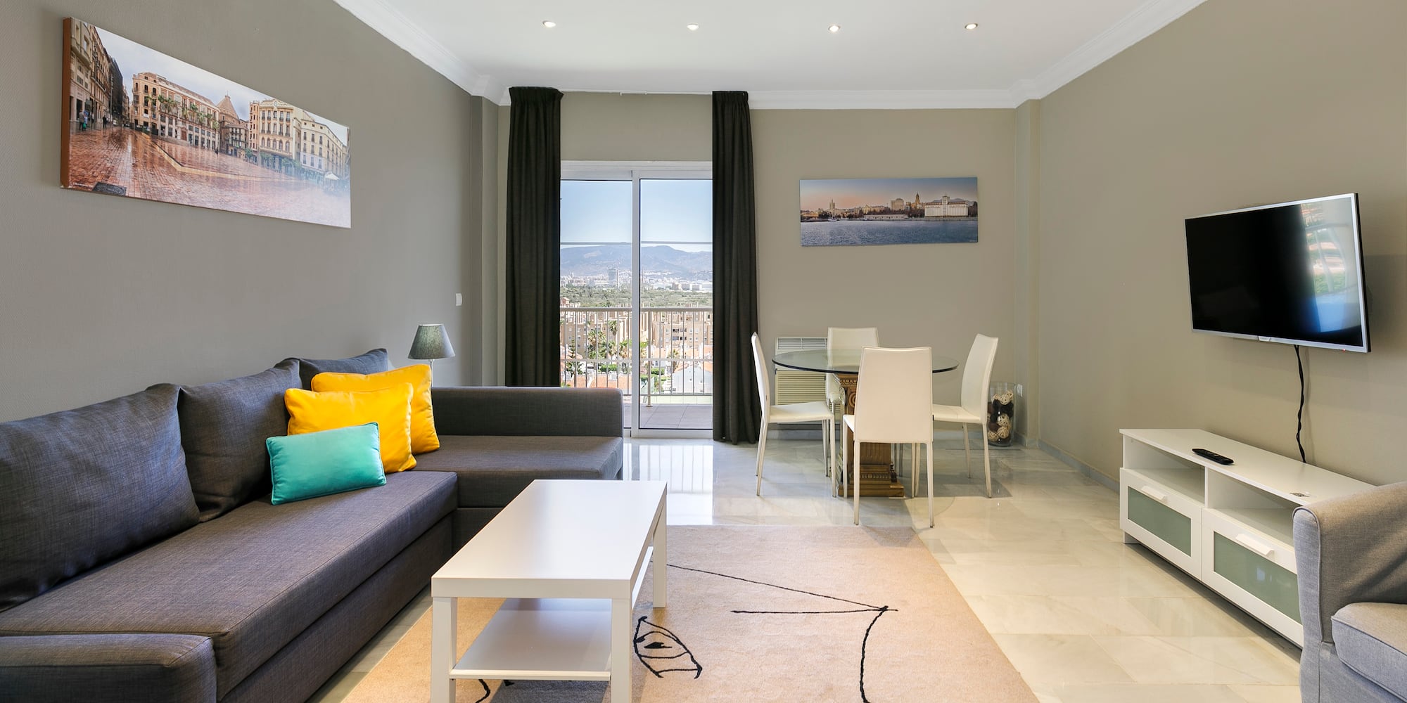 a living room with a couch and table