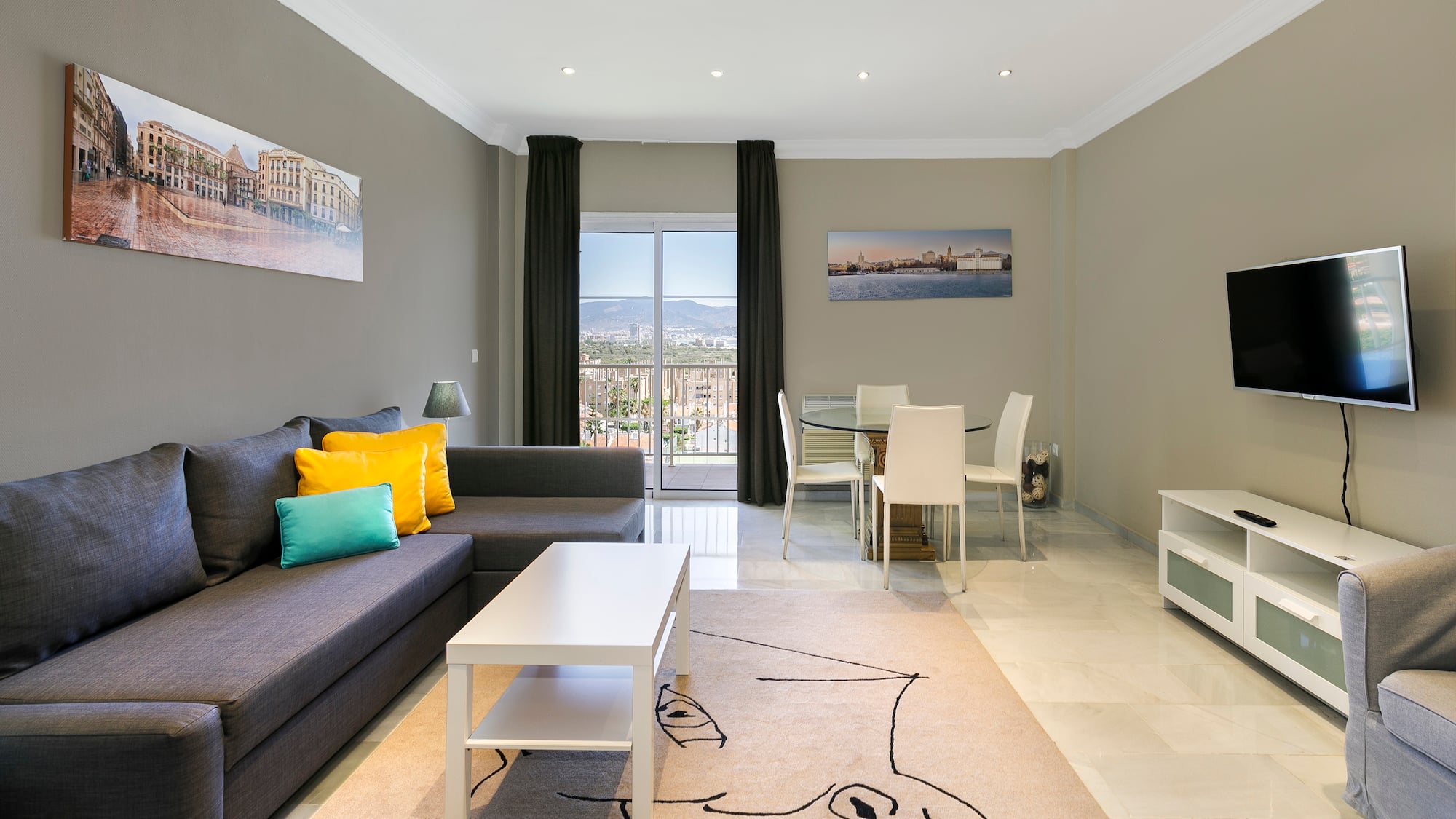 a living room with a couch and table