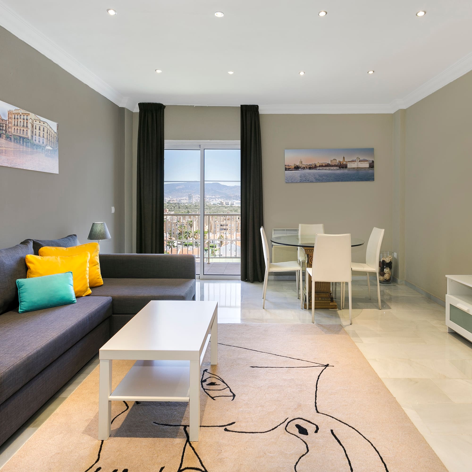 a living room with a couch and table