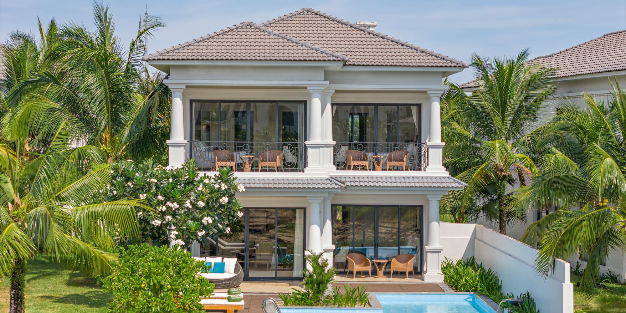 a house with a pool in the back