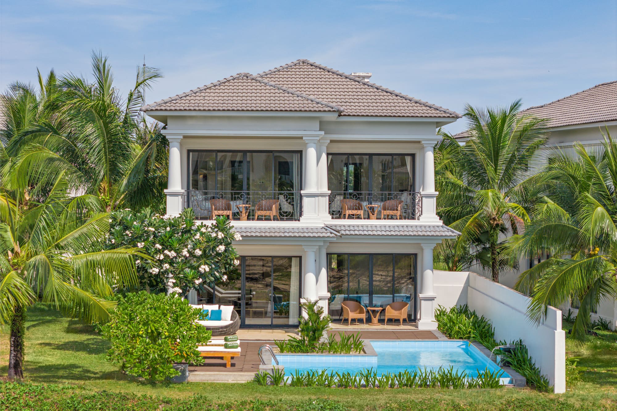 a house with a pool in the back