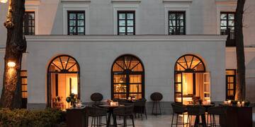 a building with tables and chairs