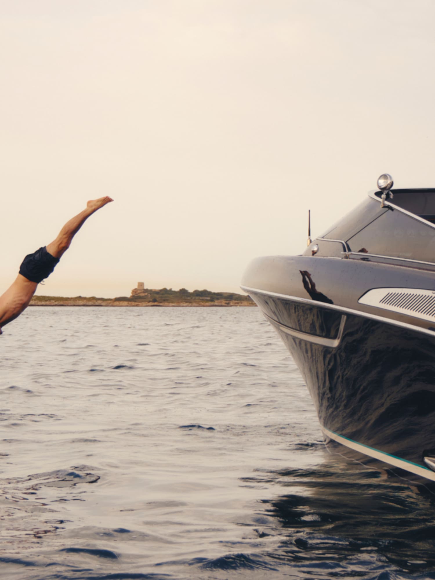 a man diving into the water