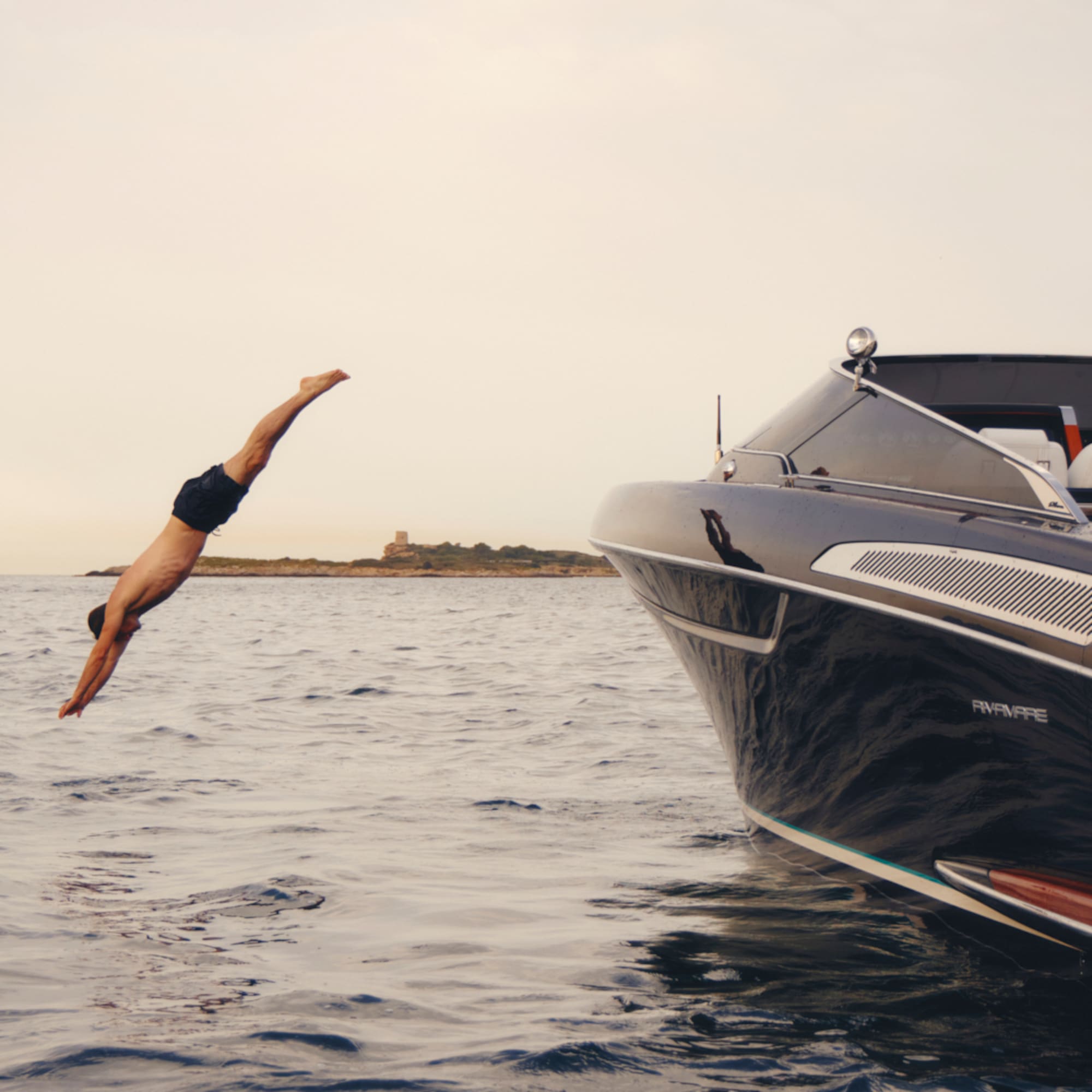 a man diving into the water