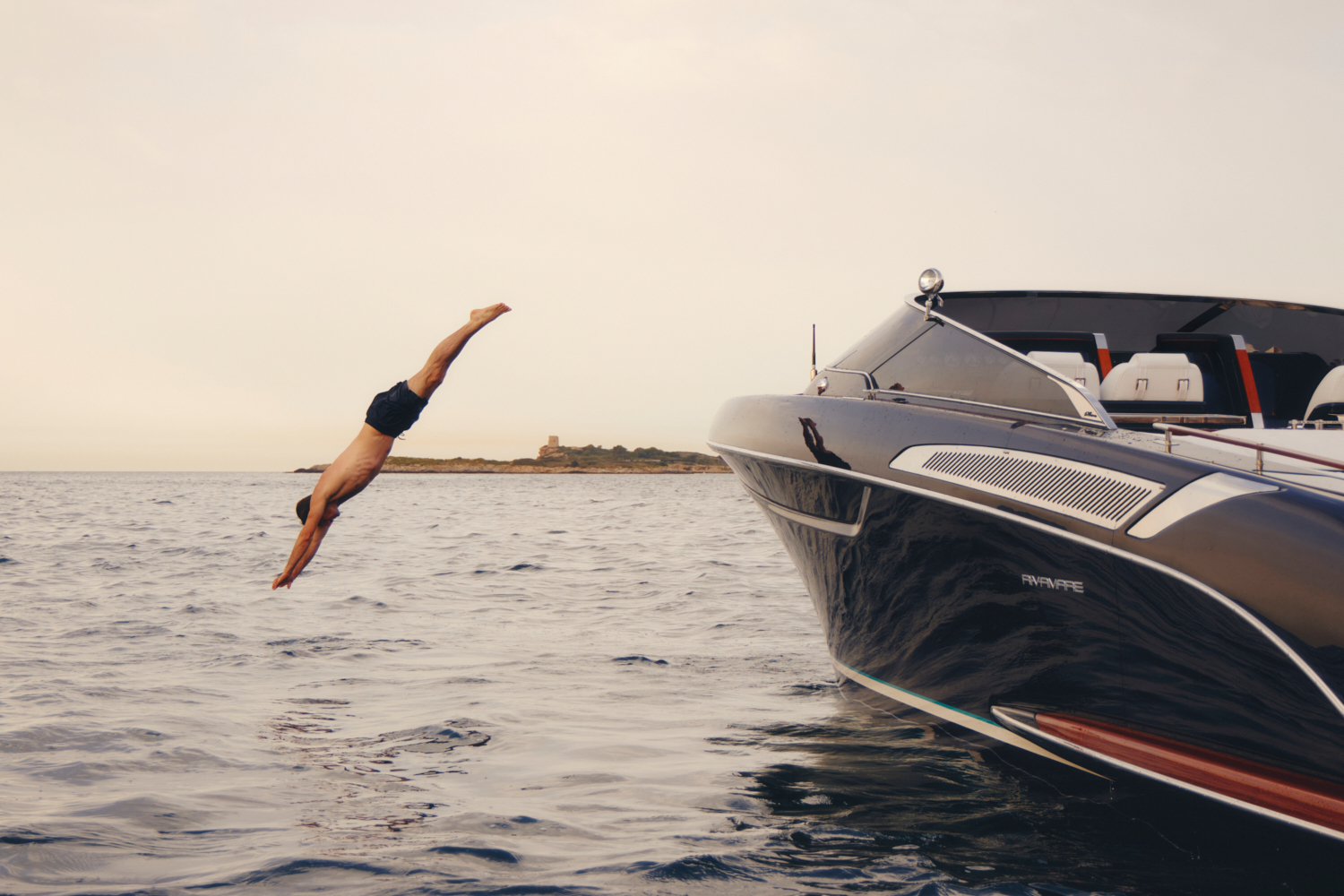 a man diving into the water