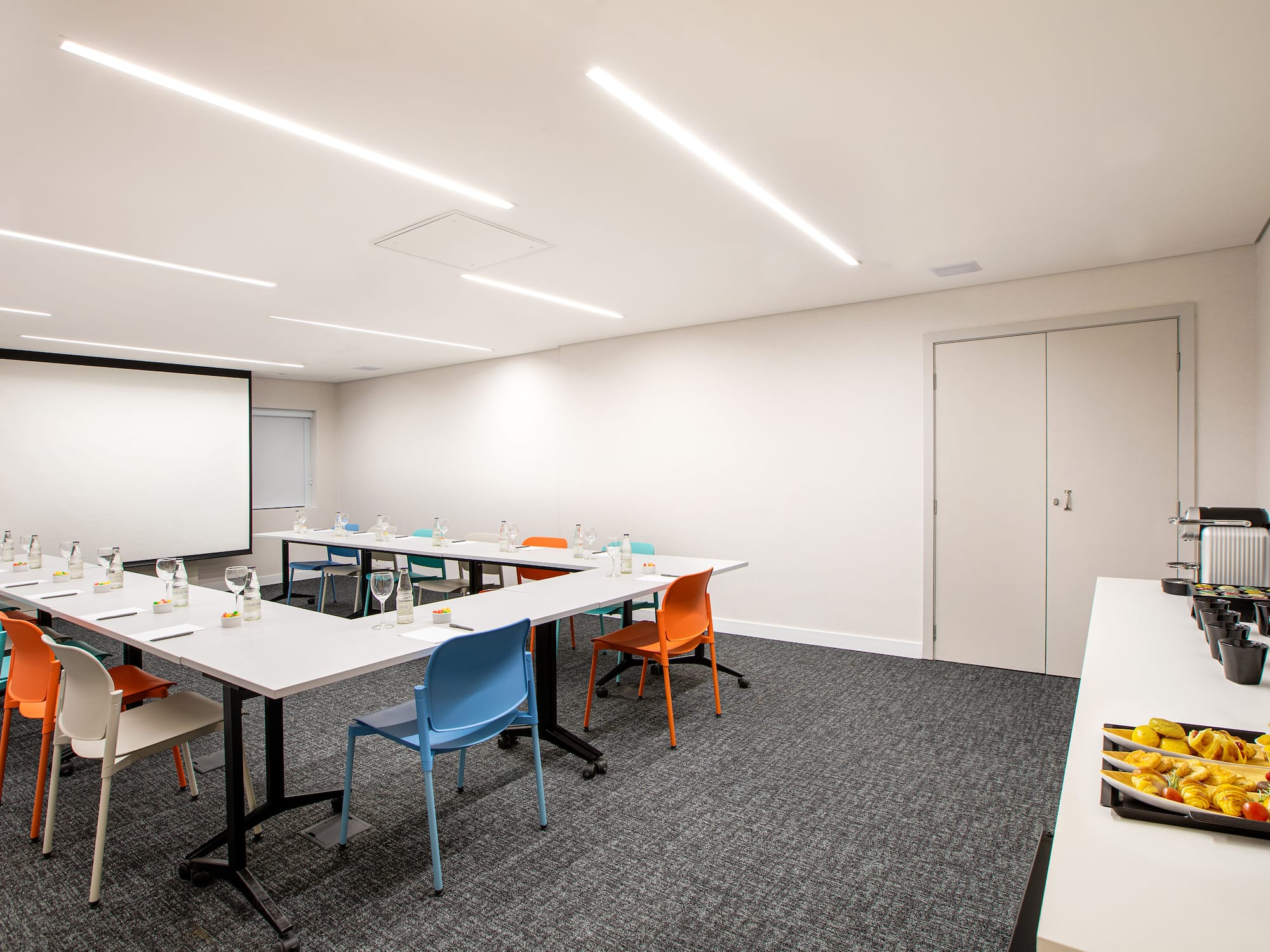 a room with tables and chairs