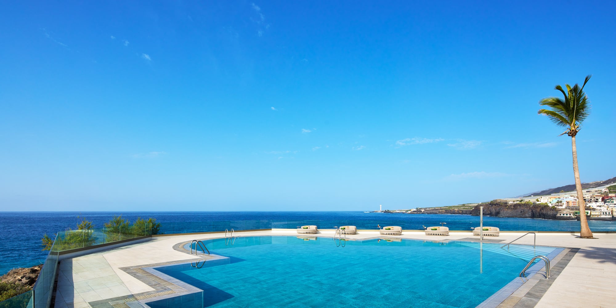 a pool with a large body of water