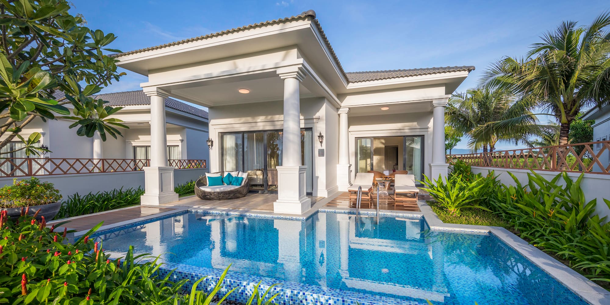 a pool in front of a house