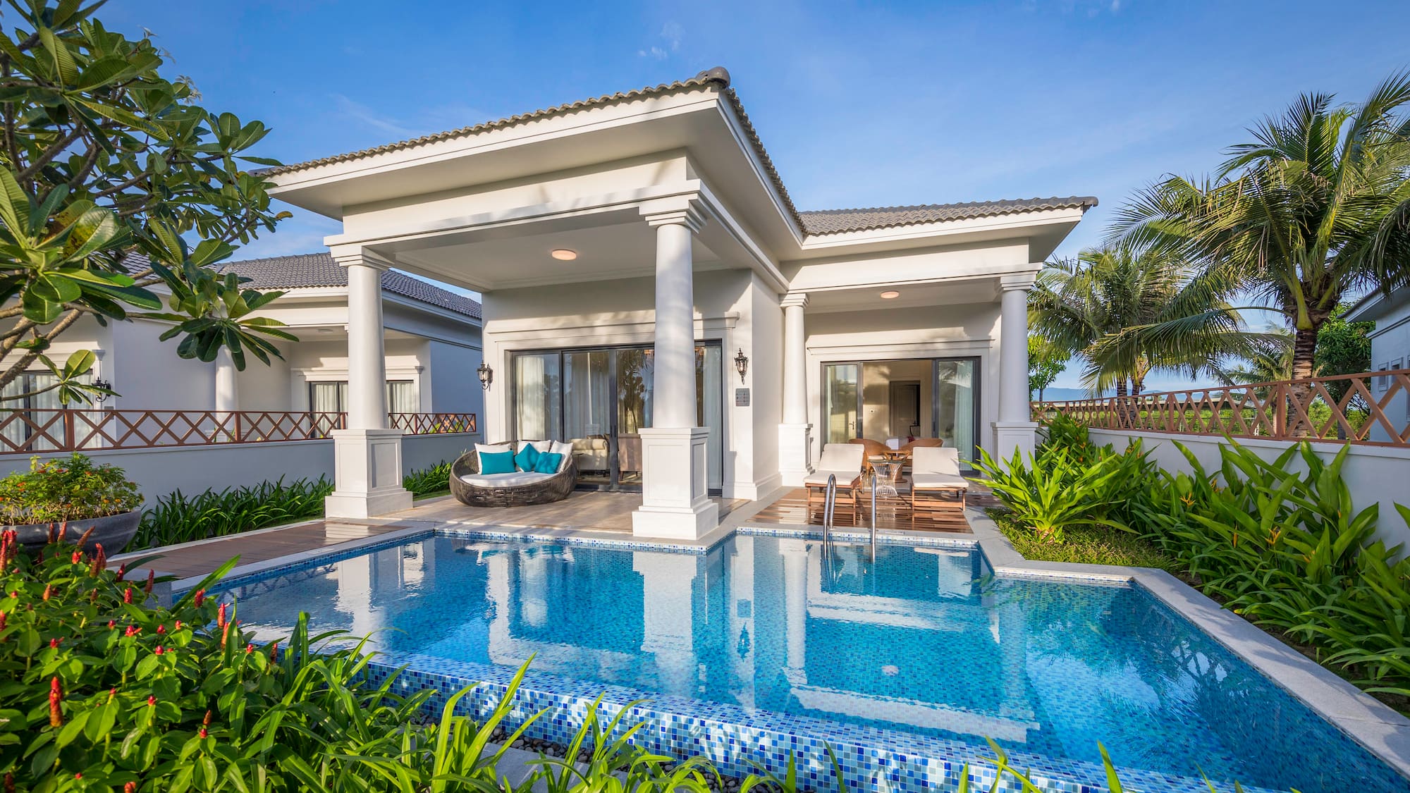 a pool in front of a house