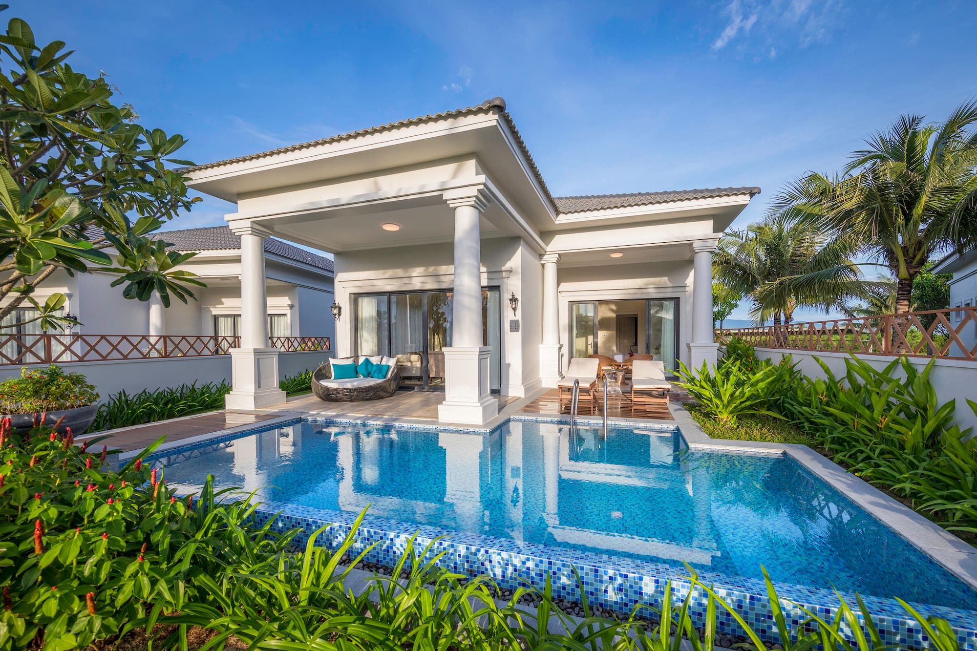 a pool in front of a house