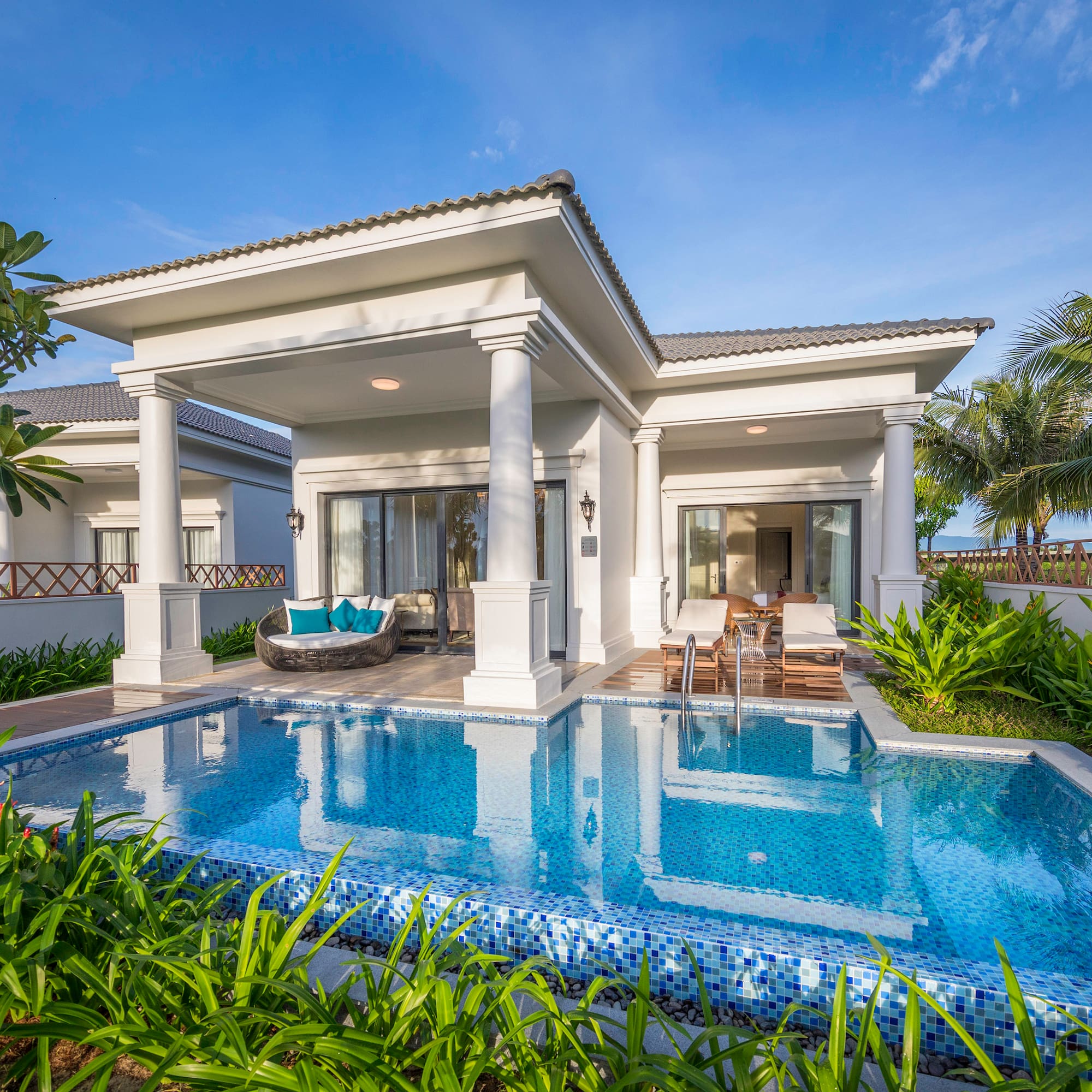 a pool in front of a house