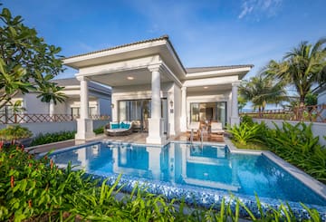 a pool in front of a house