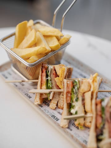 a sandwich and french fries on a plate