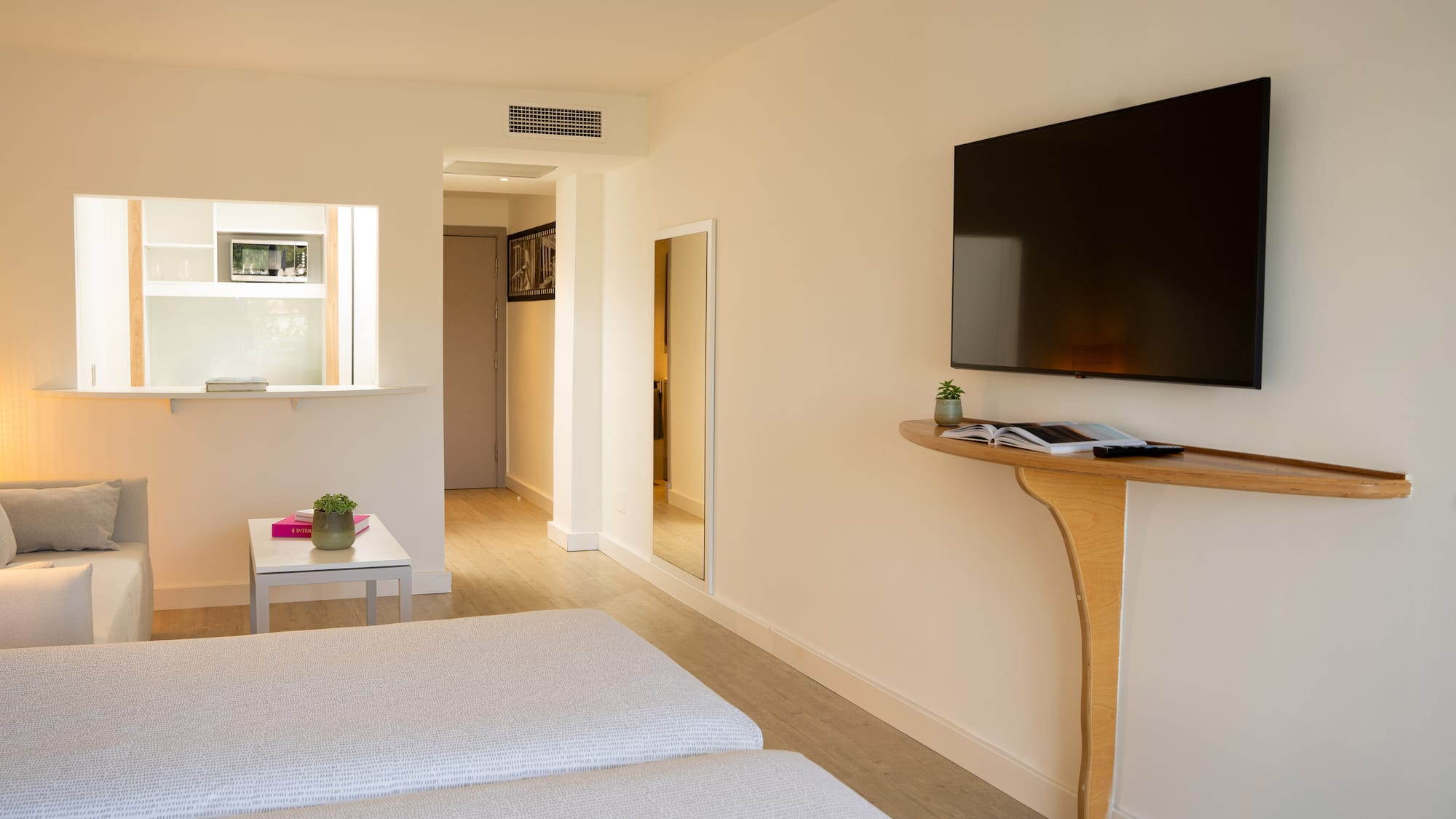 a room with a tv on the wall