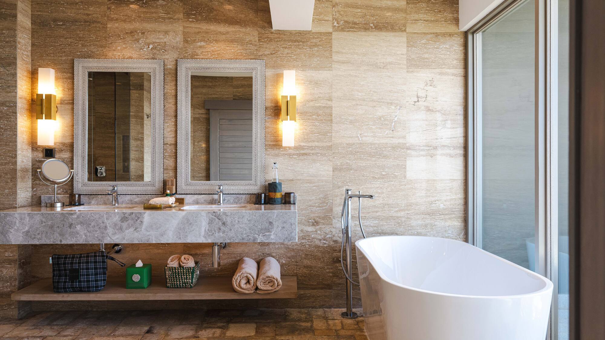 a bathroom with a tub and a sink