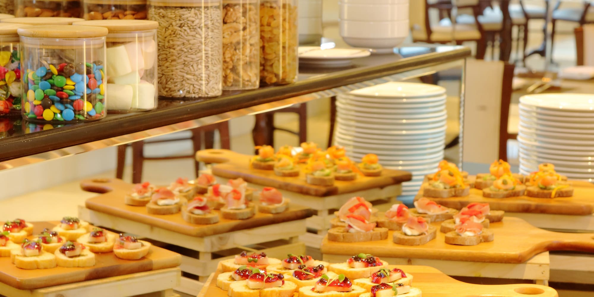 a table with food on cutting boards