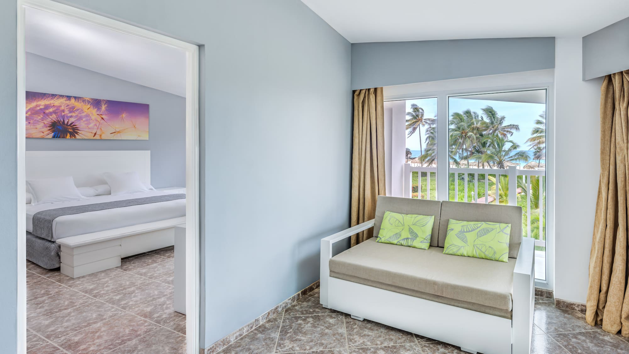 a room with a couch and a bed