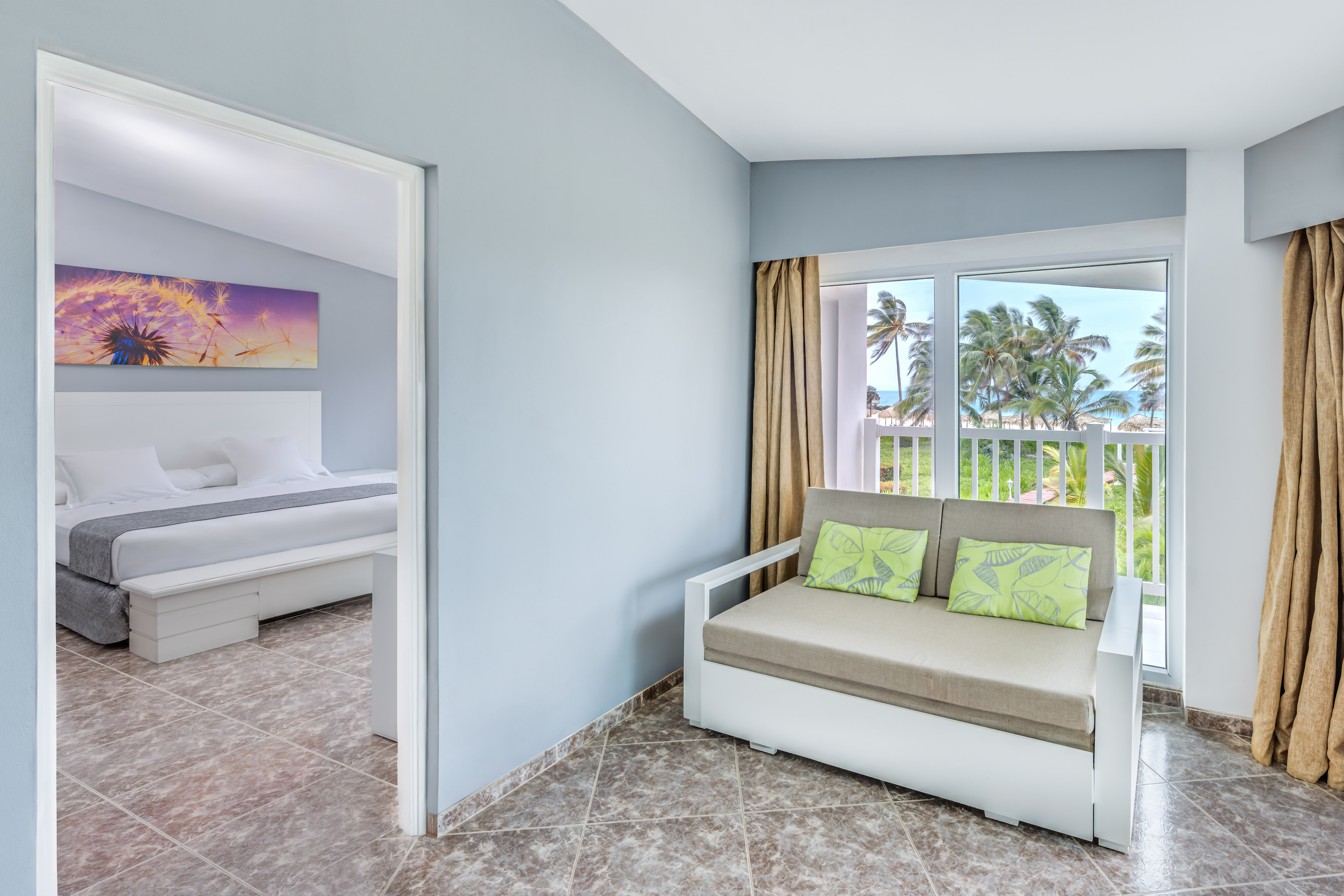 a room with a couch and a bed