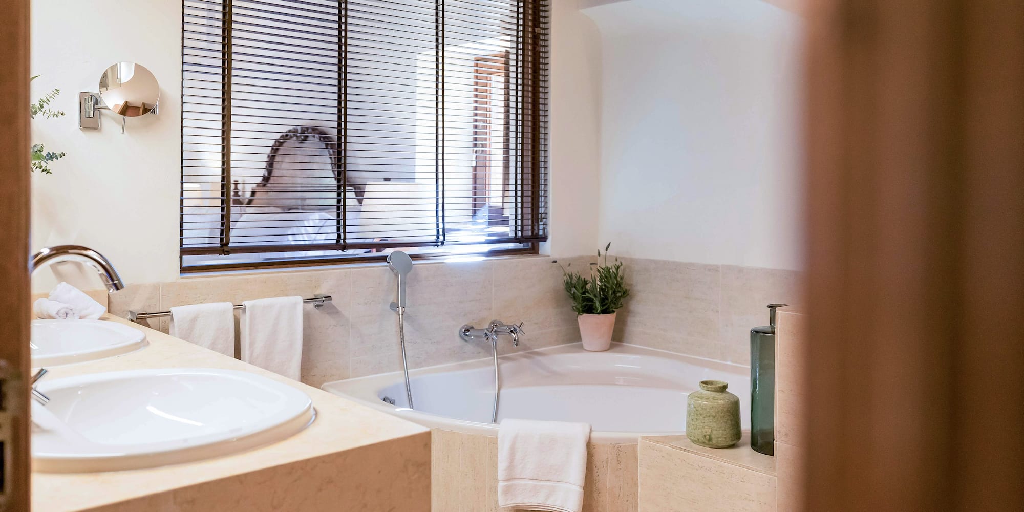 a bathroom with a tub and sink