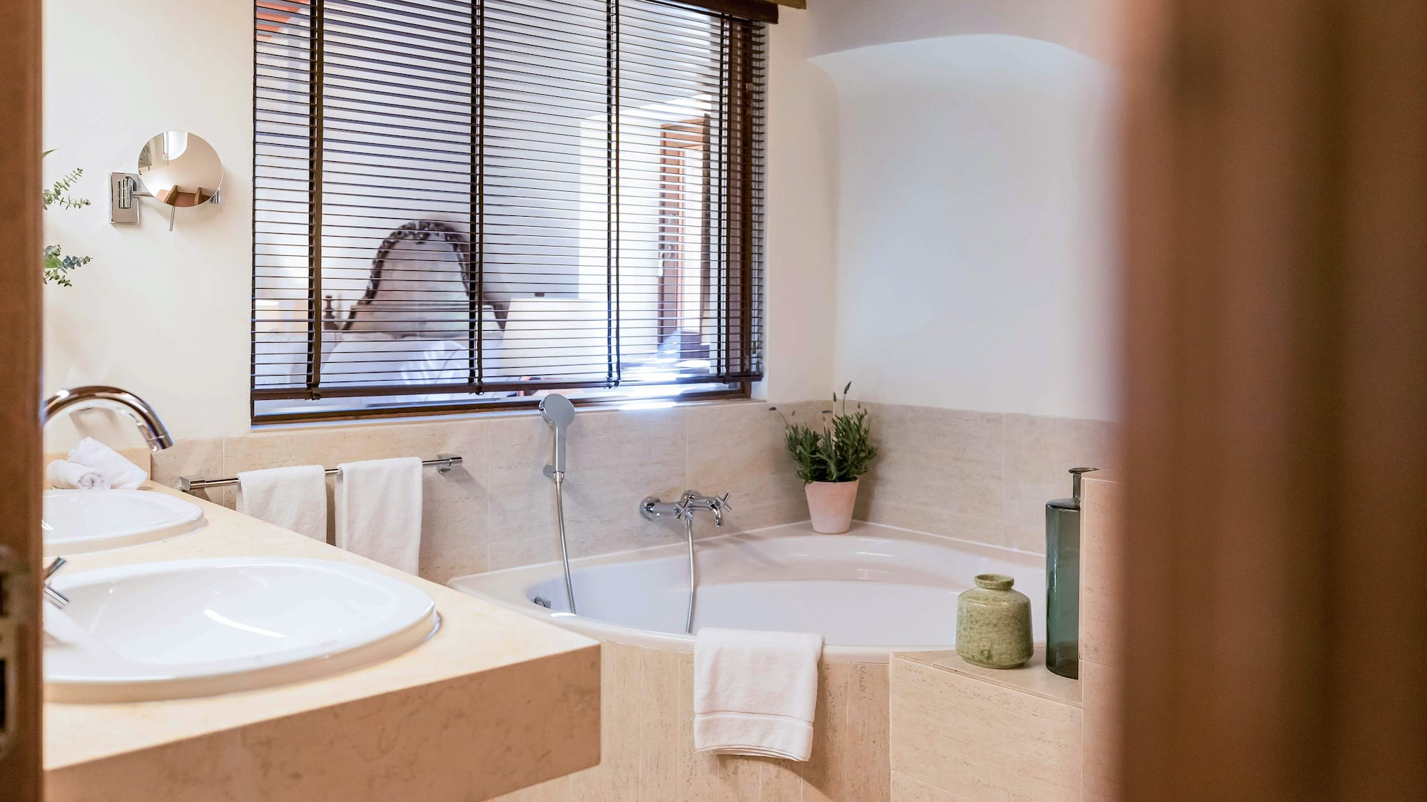 a bathroom with a tub and sink