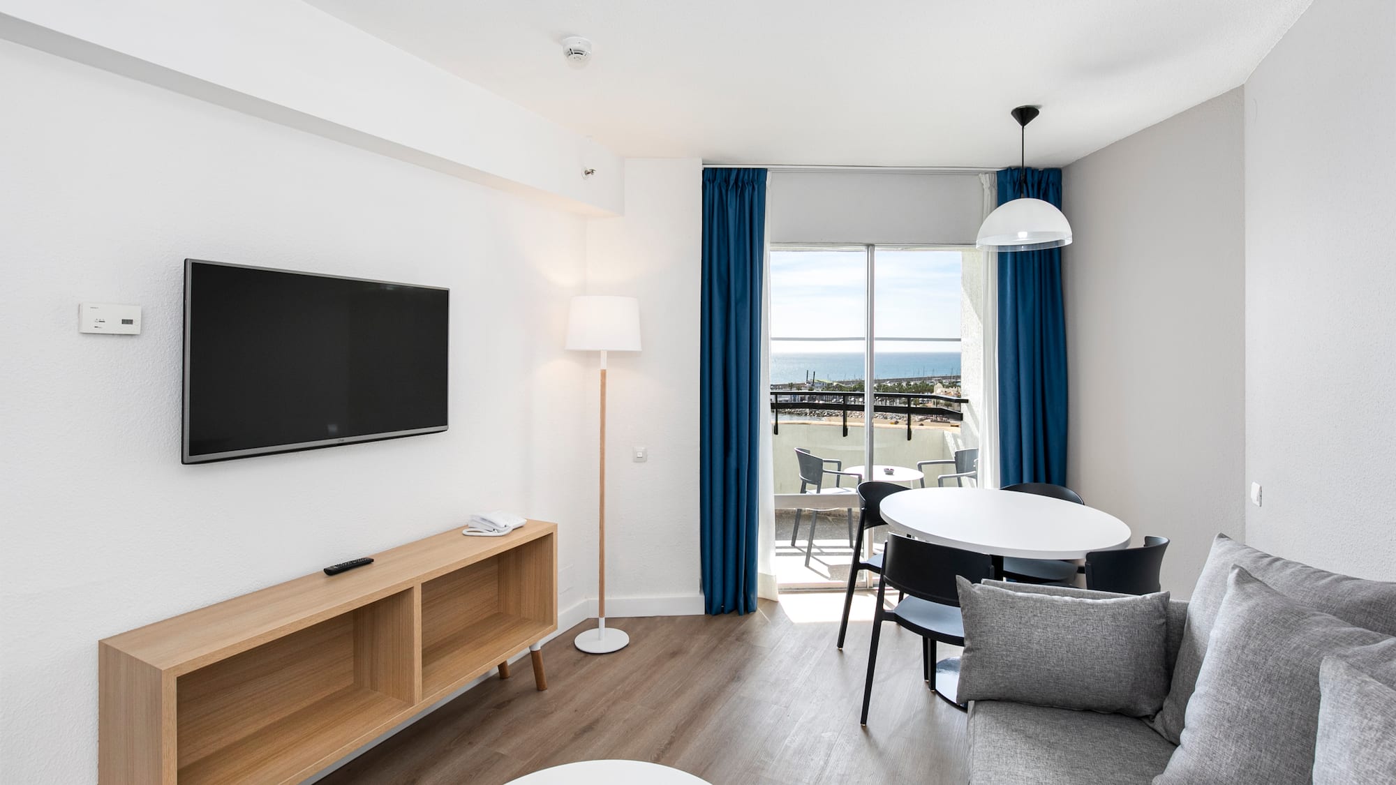 a room with a television and table