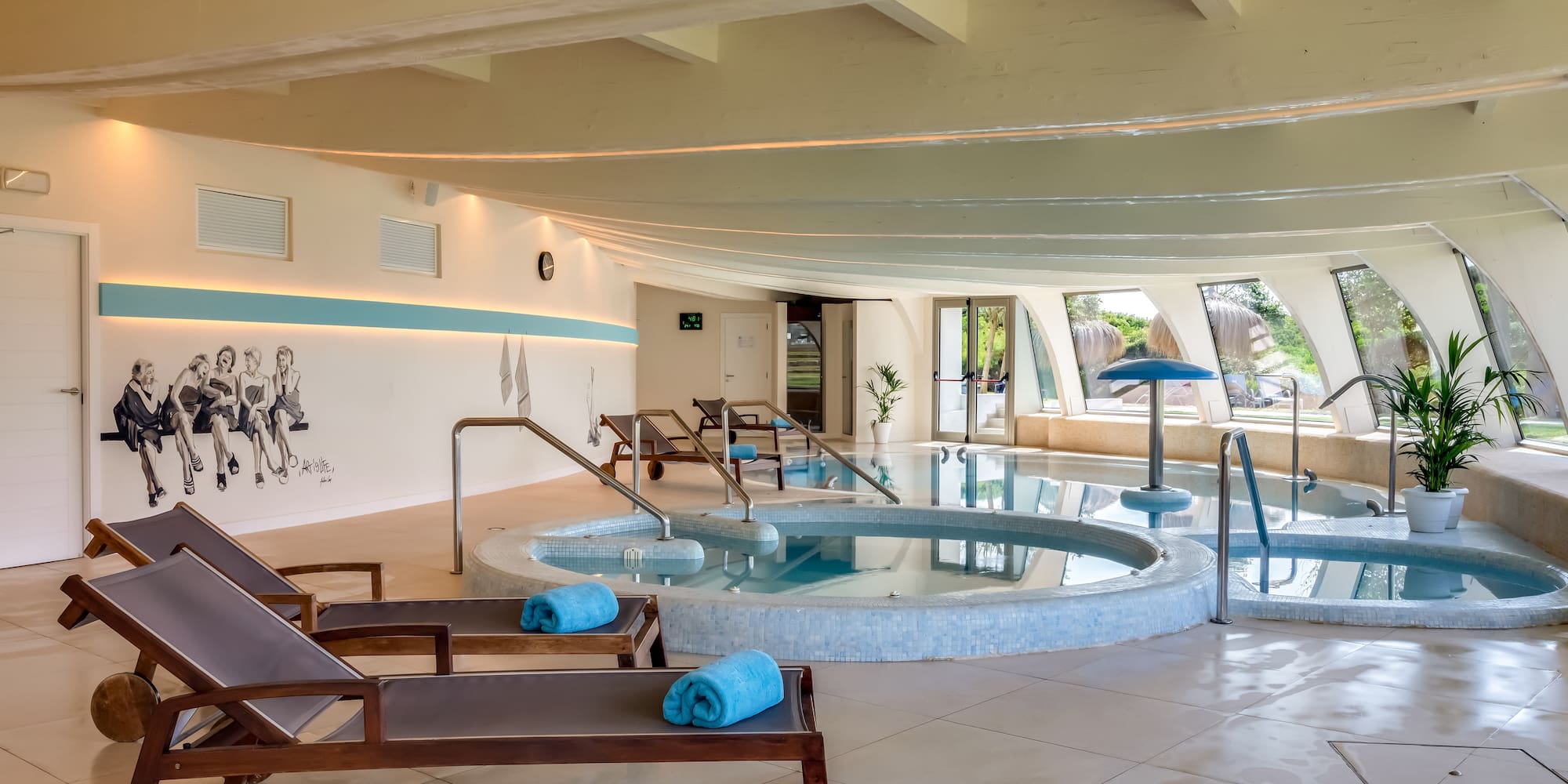 a pool with chairs and a towel on it