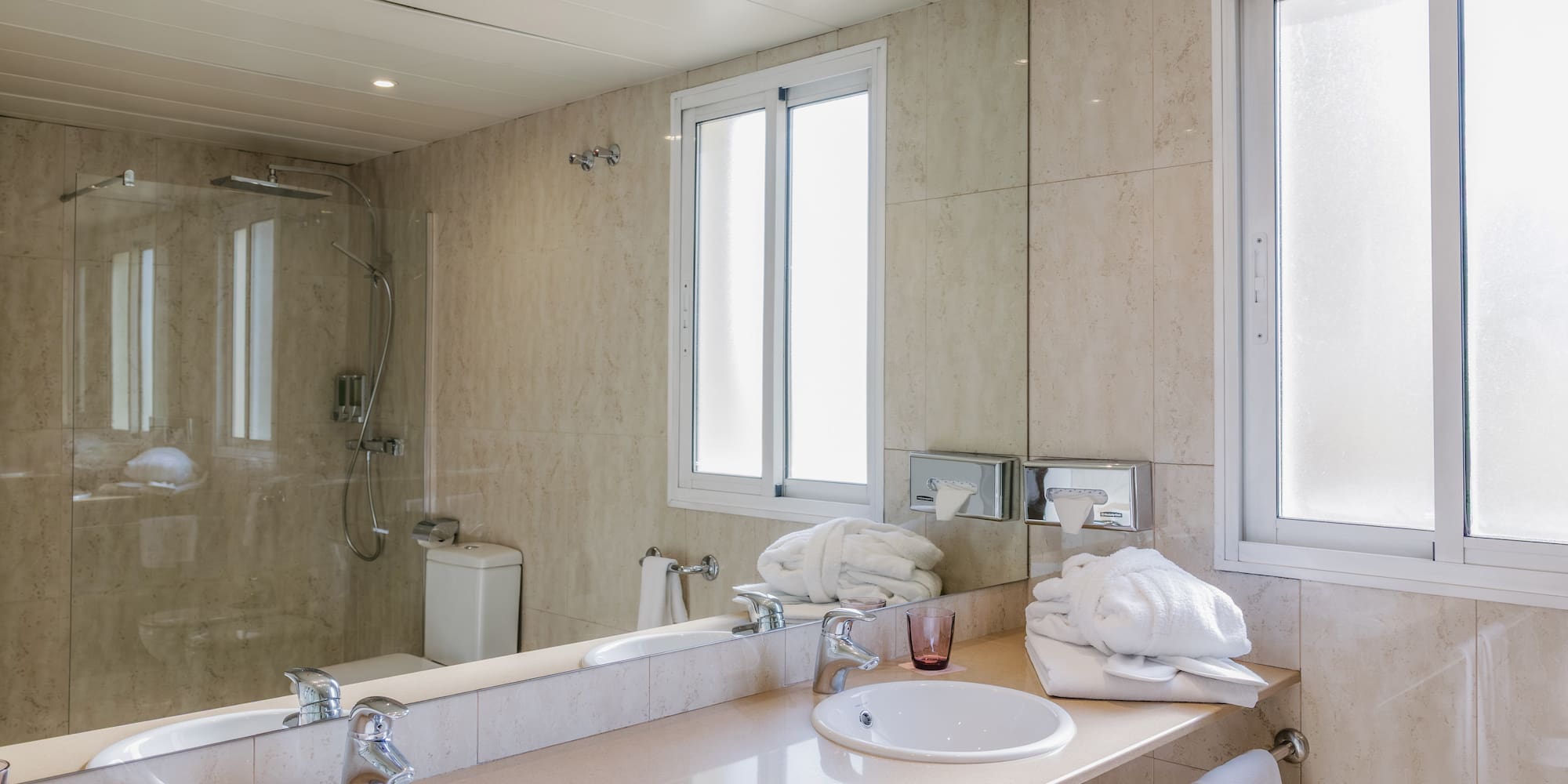 a bathroom with a sink and a shower
