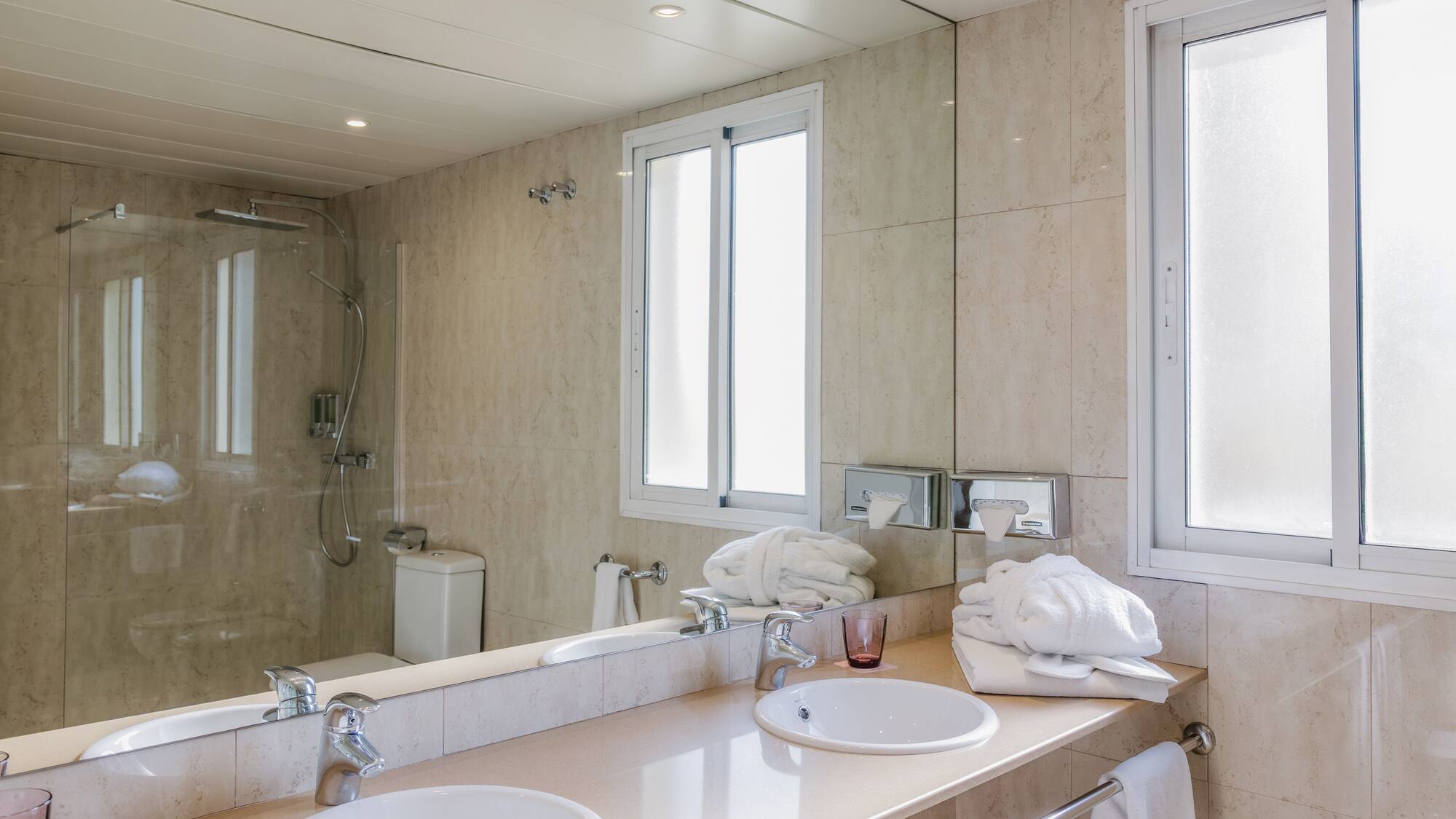 a bathroom with a sink and a shower
