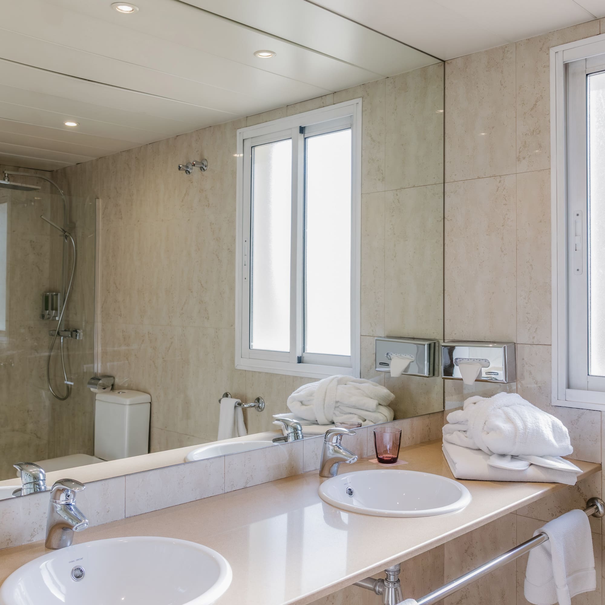 a bathroom with a sink and a shower