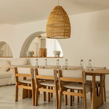 a dining table and chairs in a room