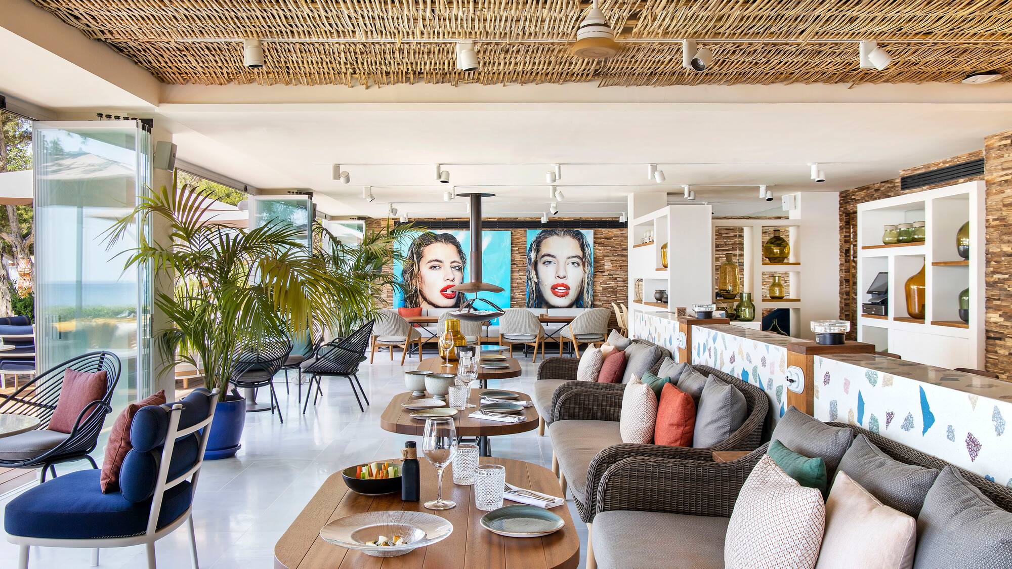 a room with a couch and tables