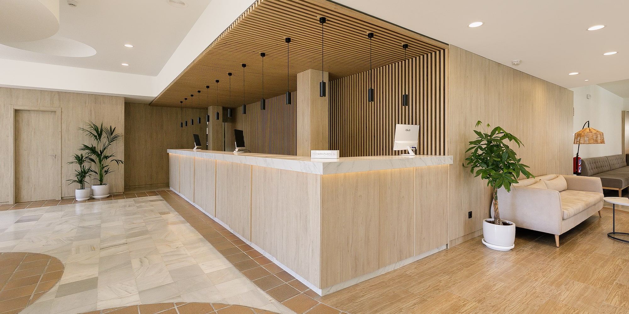 a reception desk in a hotel