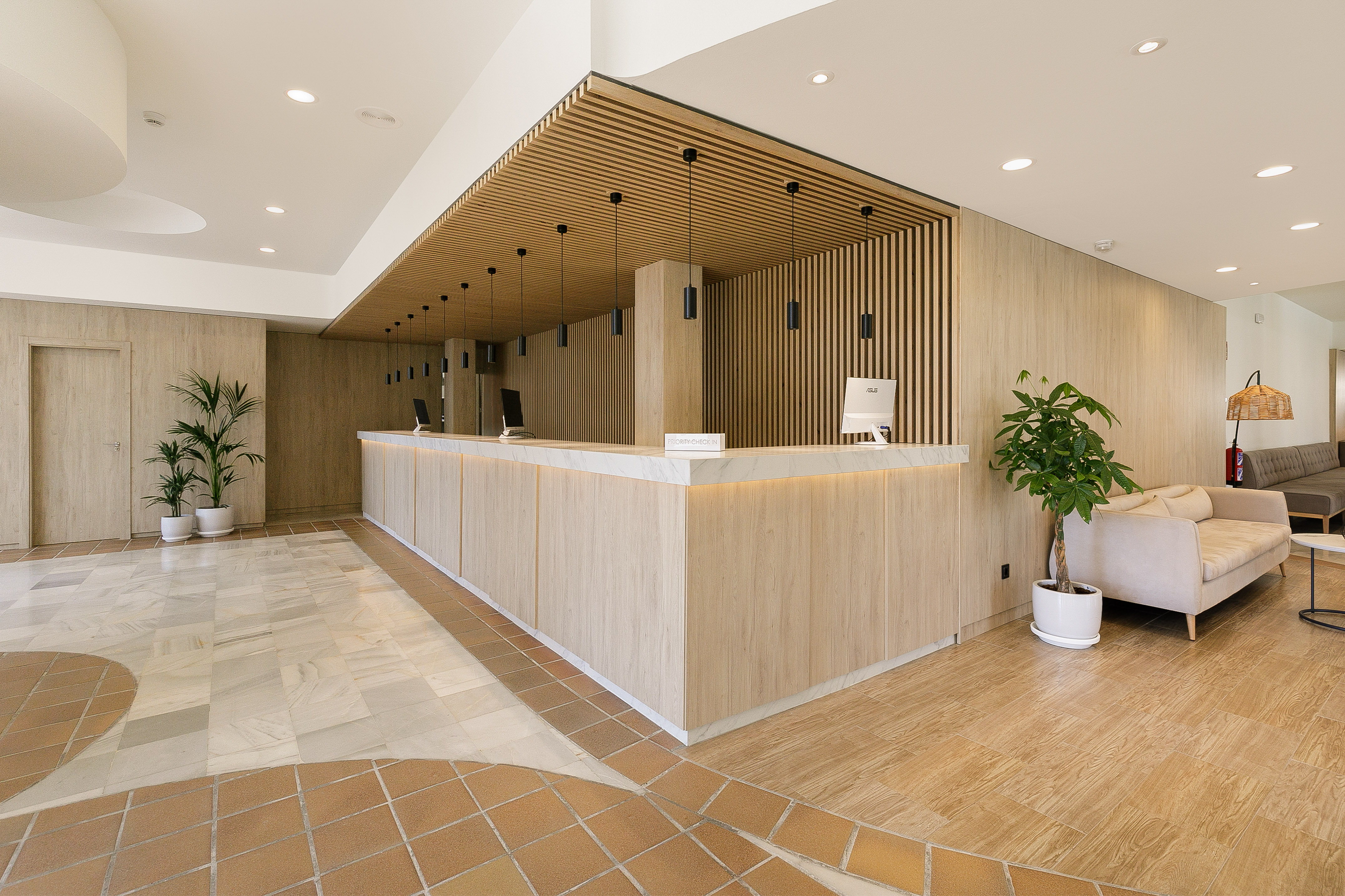 a reception desk in a hotel