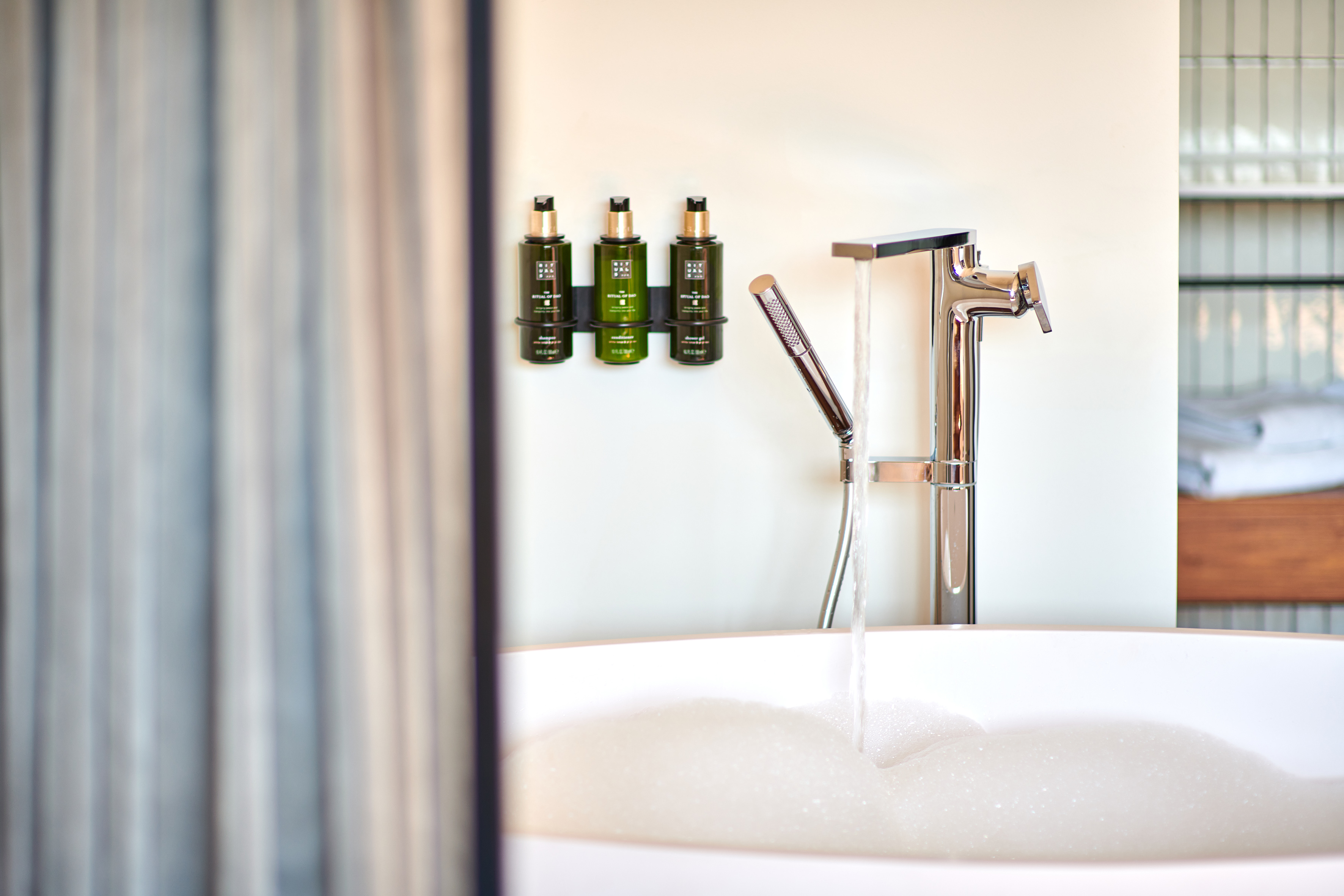 a faucet and a bathtub