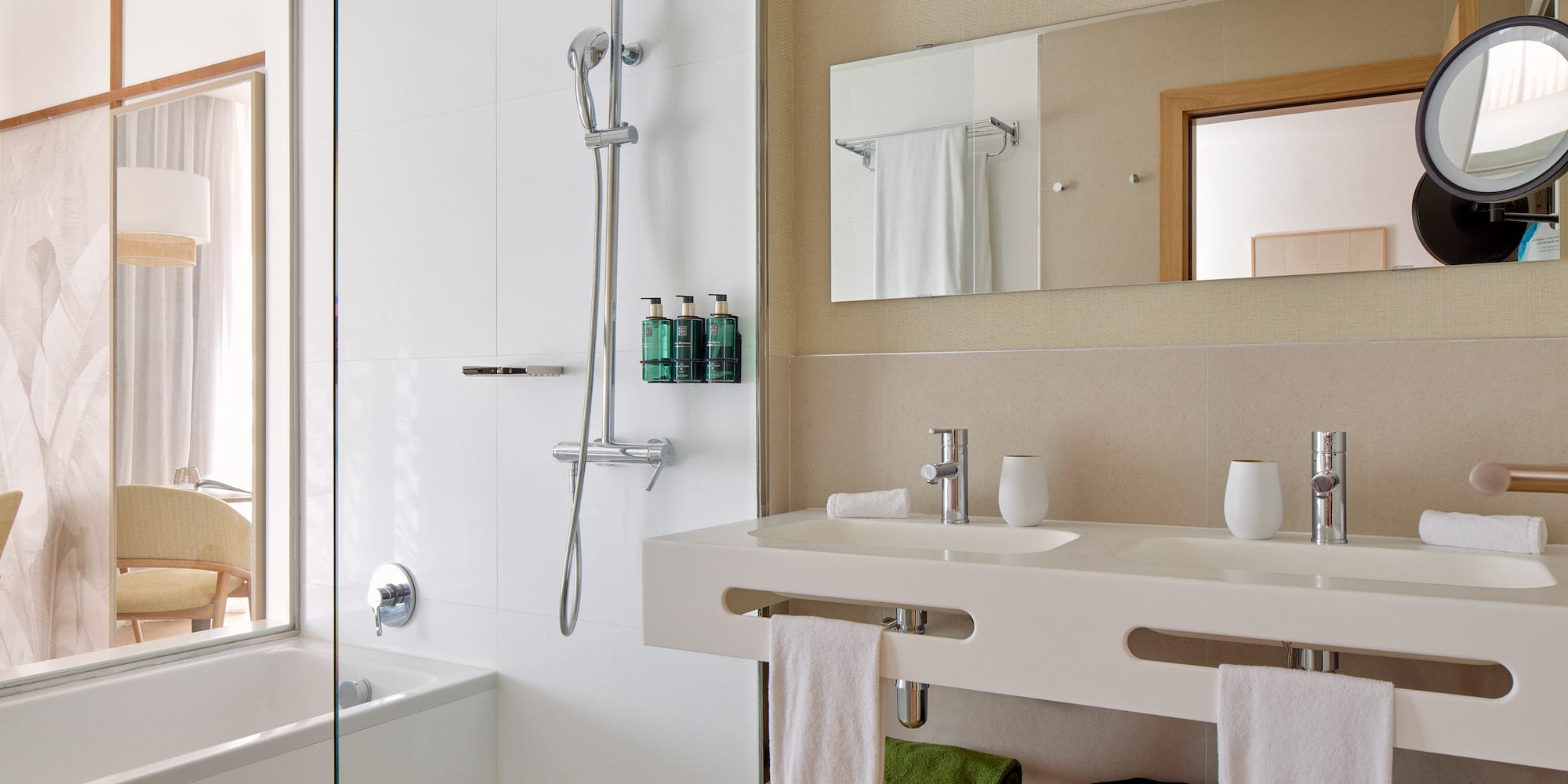 a bathroom with a shower and sink