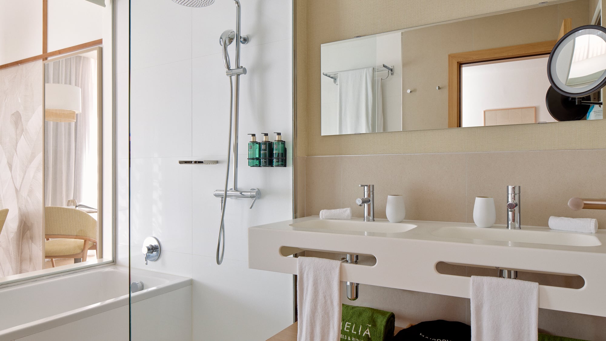 a bathroom with a shower and sink