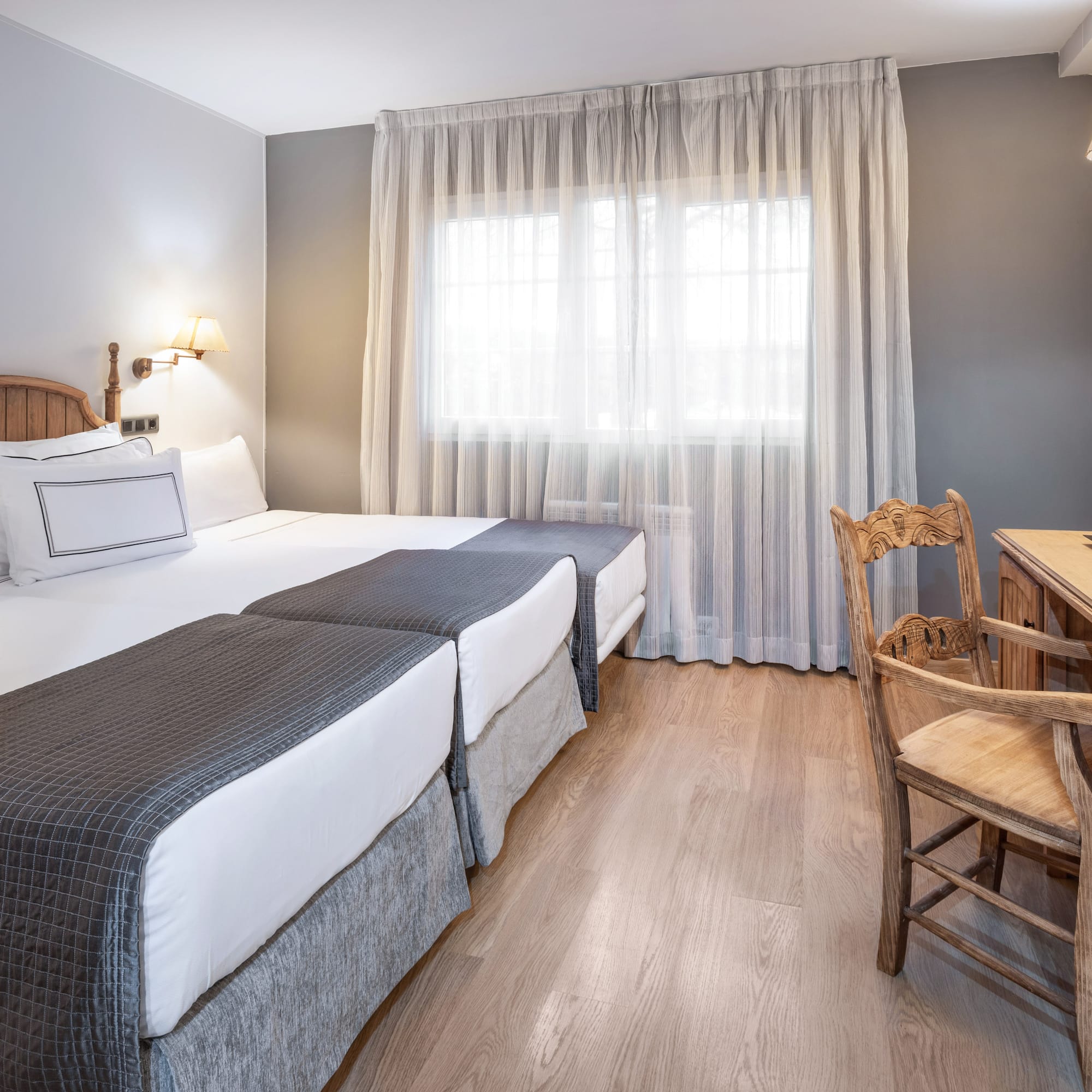 a room with a bed and a table